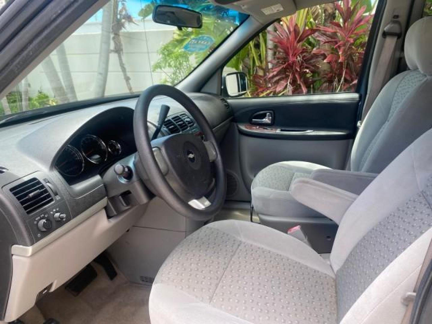 2007 Blue Granite Metallic /Medium Gray Chevrolet Uplander LS LOW MILES 70,368 (1GNDV23177D) with an 3.9L V6 SFI Engine engine, Automatic transmission, located at 4701 North Dixie Hwy, Pompano Beach, FL, 33064, (954) 422-2889, 26.240938, -80.123474 - OUR WEBPAGE FLORIDACARS1.COM HAS OVER 100 PHOTOS AND FREE CARFAX LINK 2007 CHEVROLET UPLANDER LS VIN: 1GNDV23177D130452 1 G N D V 2 3 1 7 7 D 1 3 0 4 5 2 VAN 3.9L V6 F GASOLINE FRONT WHEEL DRIVE Top Features Cloth Seats Third Row Seat Basic Features ABS Brakes AM/FM Stereo Air Conditioning Automatic - Photo#34