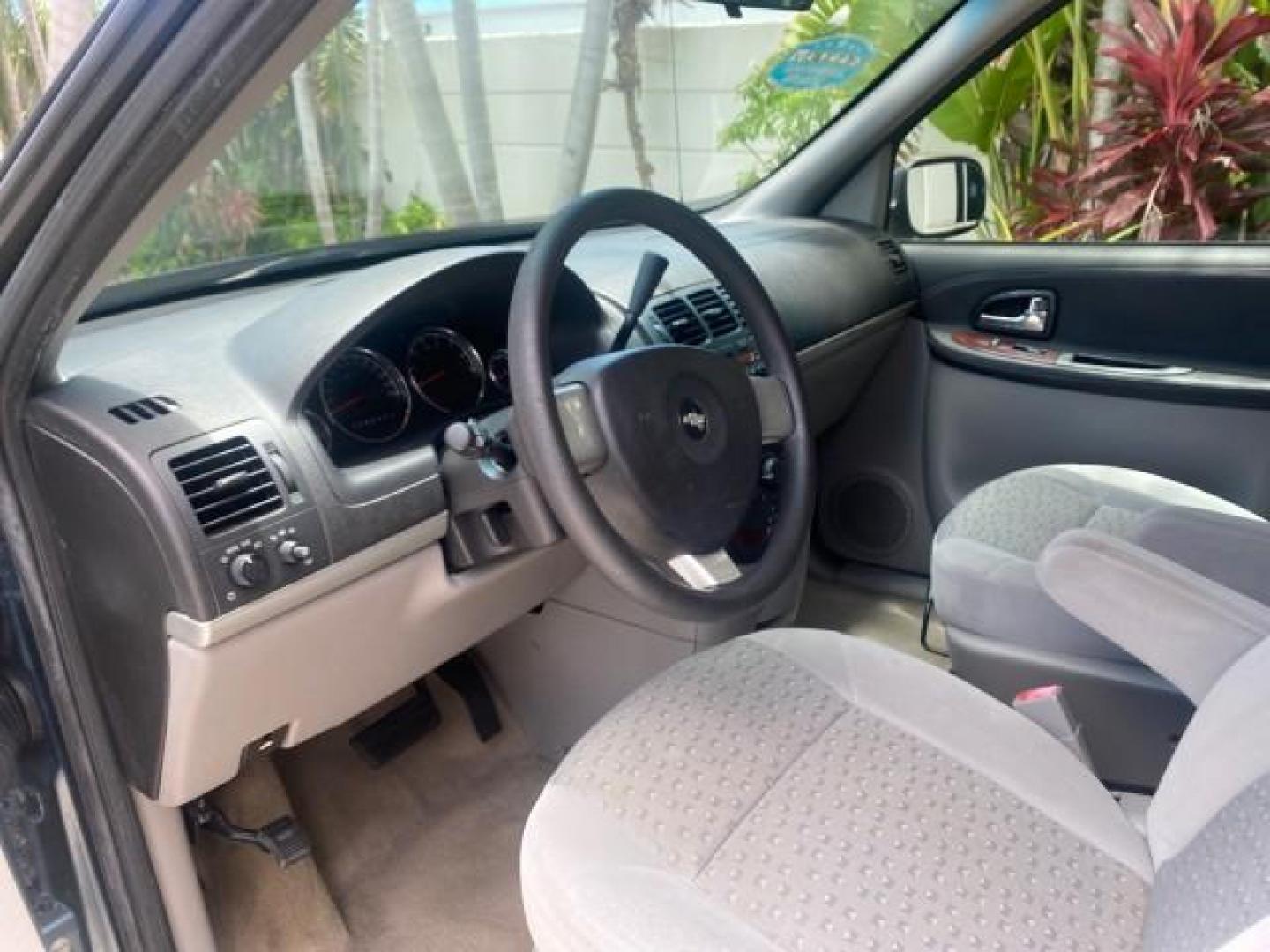 2007 Blue Granite Metallic /Medium Gray Chevrolet Uplander LS LOW MILES 70,368 (1GNDV23177D) with an 3.9L V6 SFI Engine engine, Automatic transmission, located at 4701 North Dixie Hwy, Pompano Beach, FL, 33064, (954) 422-2889, 26.240938, -80.123474 - OUR WEBPAGE FLORIDACARS1.COM HAS OVER 100 PHOTOS AND FREE CARFAX LINK 2007 CHEVROLET UPLANDER LS VIN: 1GNDV23177D130452 1 G N D V 2 3 1 7 7 D 1 3 0 4 5 2 VAN 3.9L V6 F GASOLINE FRONT WHEEL DRIVE Top Features Cloth Seats Third Row Seat Basic Features ABS Brakes AM/FM Stereo Air Conditioning Automatic - Photo#35