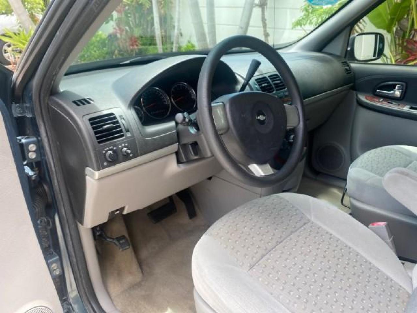 2007 Blue Granite Metallic /Medium Gray Chevrolet Uplander LS LOW MILES 70,368 (1GNDV23177D) with an 3.9L V6 SFI Engine engine, Automatic transmission, located at 4701 North Dixie Hwy, Pompano Beach, FL, 33064, (954) 422-2889, 26.240938, -80.123474 - OUR WEBPAGE FLORIDACARS1.COM HAS OVER 100 PHOTOS AND FREE CARFAX LINK 2007 CHEVROLET UPLANDER LS VIN: 1GNDV23177D130452 1 G N D V 2 3 1 7 7 D 1 3 0 4 5 2 VAN 3.9L V6 F GASOLINE FRONT WHEEL DRIVE Top Features Cloth Seats Third Row Seat Basic Features ABS Brakes AM/FM Stereo Air Conditioning Automatic - Photo#36