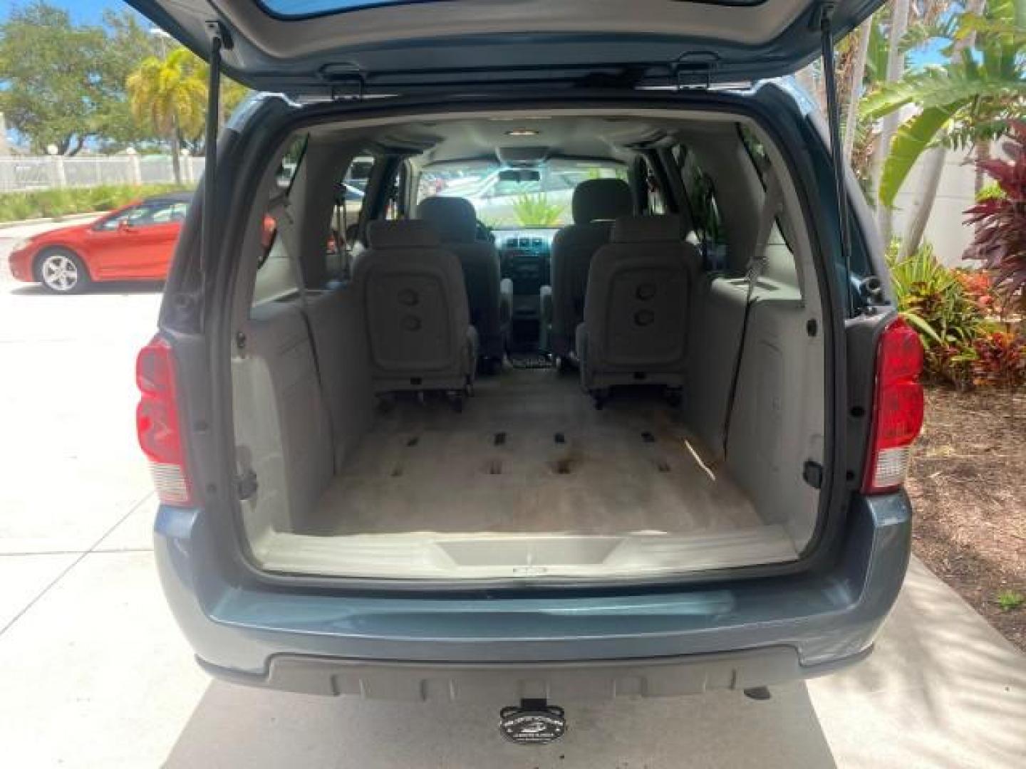 2007 Blue Granite Metallic /Medium Gray Chevrolet Uplander LS LOW MILES 70,368 (1GNDV23177D) with an 3.9L V6 SFI Engine engine, Automatic transmission, located at 4701 North Dixie Hwy, Pompano Beach, FL, 33064, (954) 422-2889, 26.240938, -80.123474 - OUR WEBPAGE FLORIDACARS1.COM HAS OVER 100 PHOTOS AND FREE CARFAX LINK 2007 CHEVROLET UPLANDER LS VIN: 1GNDV23177D130452 1 G N D V 2 3 1 7 7 D 1 3 0 4 5 2 VAN 3.9L V6 F GASOLINE FRONT WHEEL DRIVE Top Features Cloth Seats Third Row Seat Basic Features ABS Brakes AM/FM Stereo Air Conditioning Automatic - Photo#71