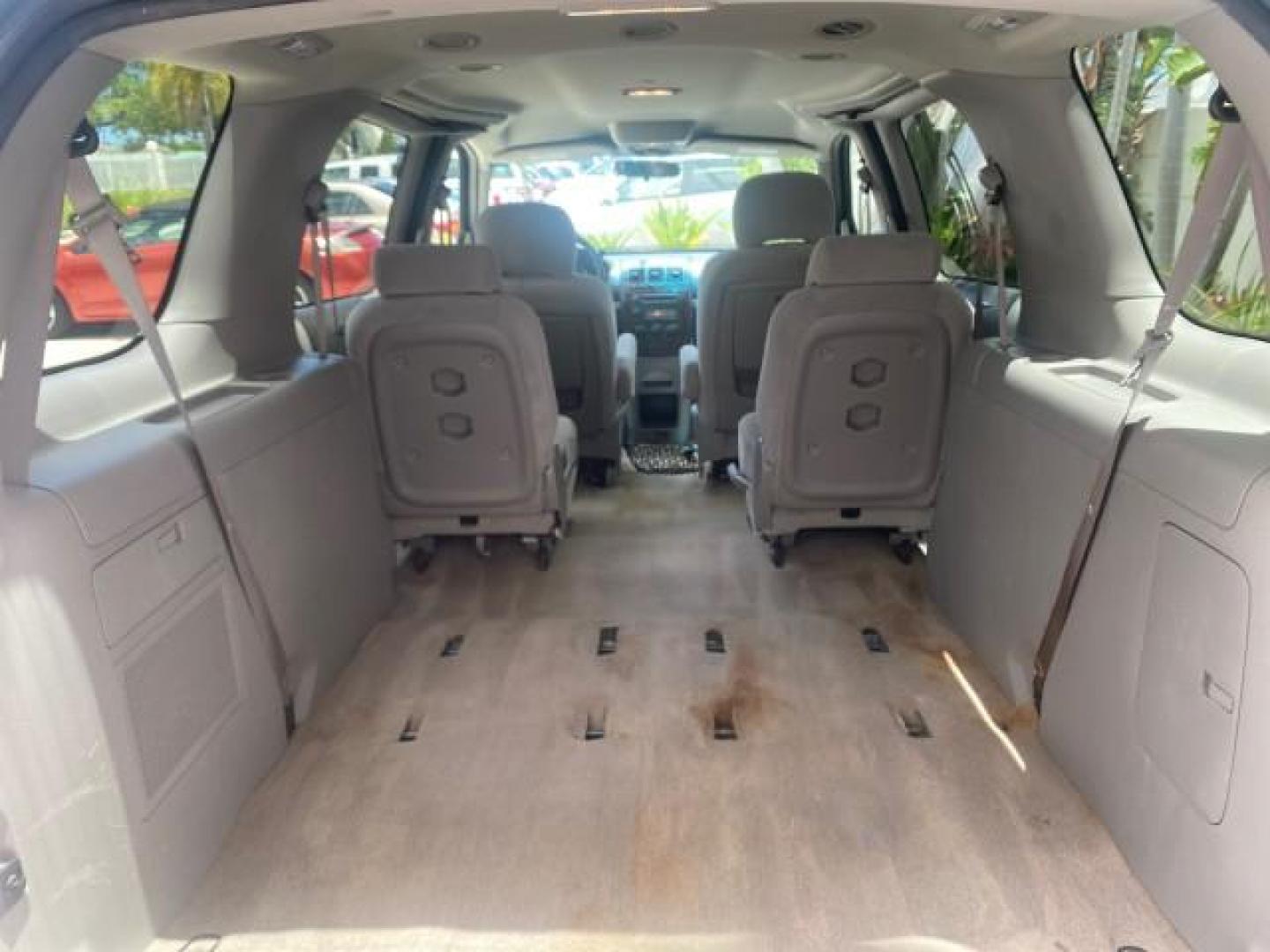 2007 Blue Granite Metallic /Medium Gray Chevrolet Uplander LS LOW MILES 70,368 (1GNDV23177D) with an 3.9L V6 SFI Engine engine, Automatic transmission, located at 4701 North Dixie Hwy, Pompano Beach, FL, 33064, (954) 422-2889, 26.240938, -80.123474 - OUR WEBPAGE FLORIDACARS1.COM HAS OVER 100 PHOTOS AND FREE CARFAX LINK 2007 CHEVROLET UPLANDER LS VIN: 1GNDV23177D130452 1 G N D V 2 3 1 7 7 D 1 3 0 4 5 2 VAN 3.9L V6 F GASOLINE FRONT WHEEL DRIVE Top Features Cloth Seats Third Row Seat Basic Features ABS Brakes AM/FM Stereo Air Conditioning Automatic - Photo#72