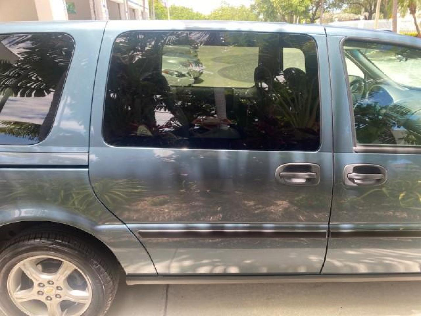 2007 Blue Granite Metallic /Medium Gray Chevrolet Uplander LS LOW MILES 70,368 (1GNDV23177D) with an 3.9L V6 SFI Engine engine, Automatic transmission, located at 4701 North Dixie Hwy, Pompano Beach, FL, 33064, (954) 422-2889, 26.240938, -80.123474 - OUR WEBPAGE FLORIDACARS1.COM HAS OVER 100 PHOTOS AND FREE CARFAX LINK 2007 CHEVROLET UPLANDER LS VIN: 1GNDV23177D130452 1 G N D V 2 3 1 7 7 D 1 3 0 4 5 2 VAN 3.9L V6 F GASOLINE FRONT WHEEL DRIVE Top Features Cloth Seats Third Row Seat Basic Features ABS Brakes AM/FM Stereo Air Conditioning Automatic - Photo#77