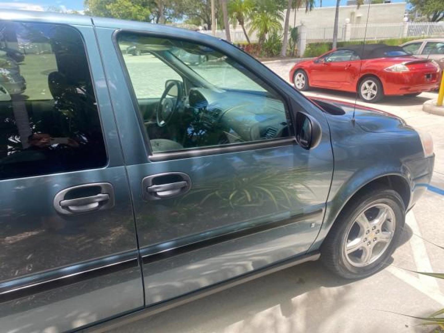 2007 Blue Granite Metallic /Medium Gray Chevrolet Uplander LS LOW MILES 70,368 (1GNDV23177D) with an 3.9L V6 SFI Engine engine, Automatic transmission, located at 4701 North Dixie Hwy, Pompano Beach, FL, 33064, (954) 422-2889, 26.240938, -80.123474 - OUR WEBPAGE FLORIDACARS1.COM HAS OVER 100 PHOTOS AND FREE CARFAX LINK 2007 CHEVROLET UPLANDER LS VIN: 1GNDV23177D130452 1 G N D V 2 3 1 7 7 D 1 3 0 4 5 2 VAN 3.9L V6 F GASOLINE FRONT WHEEL DRIVE Top Features Cloth Seats Third Row Seat Basic Features ABS Brakes AM/FM Stereo Air Conditioning Automatic - Photo#85