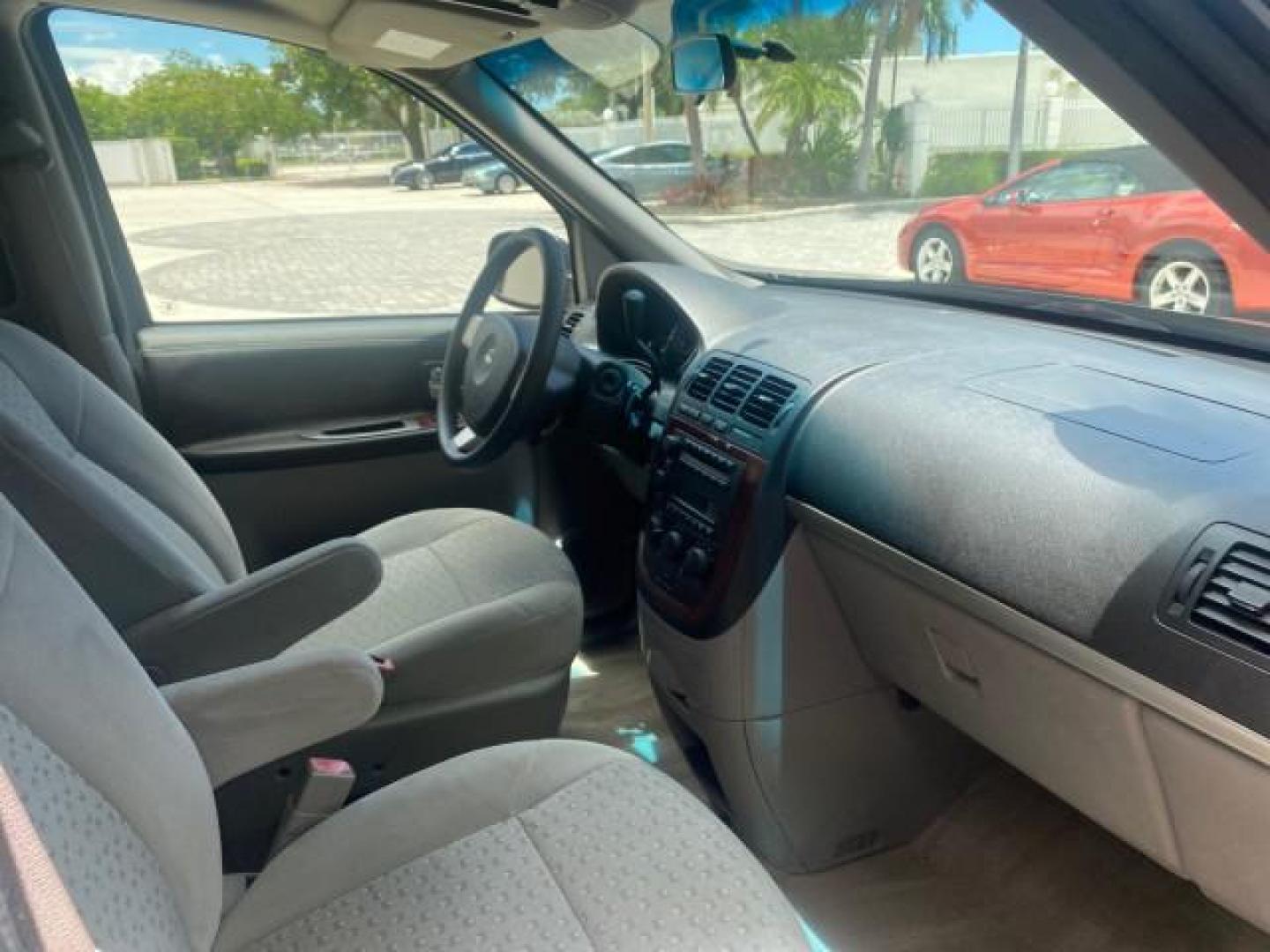 2007 Blue Granite Metallic /Medium Gray Chevrolet Uplander LS LOW MILES 70,368 (1GNDV23177D) with an 3.9L V6 SFI Engine engine, Automatic transmission, located at 4701 North Dixie Hwy, Pompano Beach, FL, 33064, (954) 422-2889, 26.240938, -80.123474 - OUR WEBPAGE FLORIDACARS1.COM HAS OVER 100 PHOTOS AND FREE CARFAX LINK 2007 CHEVROLET UPLANDER LS VIN: 1GNDV23177D130452 1 G N D V 2 3 1 7 7 D 1 3 0 4 5 2 VAN 3.9L V6 F GASOLINE FRONT WHEEL DRIVE Top Features Cloth Seats Third Row Seat Basic Features ABS Brakes AM/FM Stereo Air Conditioning Automatic - Photo#91
