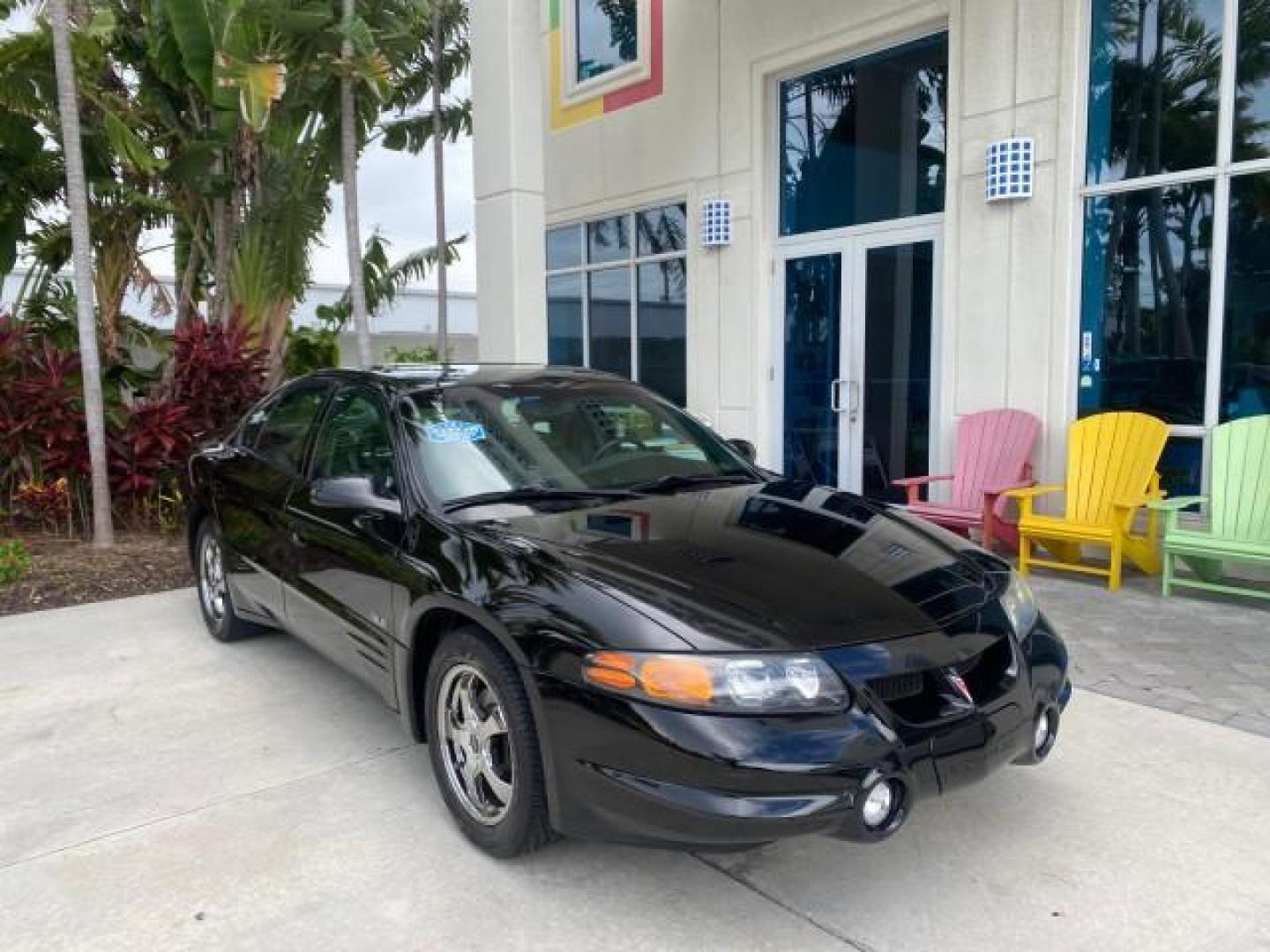 2002 Black /Dark Pewter Pontiac Bonneville SLE LOW MILES 82,619 (1G2HY54K224) with an 3.8L SFI V6 3800 Series II Engine engine, Automatic transmission, located at 4701 North Dixie Hwy, Pompano Beach, FL, 33064, (954) 422-2889, 26.240938, -80.123474 - OUR WEBPAGE FLORIDACARS1.COM HAS OVER 100 PHOTOS AND FREE CARFAX LINK 2002 PONTIAC BONNEVILLE SLE VIN: 1G2HY54K224170512 1 G 2 H Y 5 4 K 2 2 4 1 7 0 5 1 2 SEDAN 4 DR 3.8L V6 F GASOLINE FRONT WHEEL DRIVE Top Features Alloy Wheels Front Seat Heaters Leather Seats Sunroof(s) Basic Features ABS Brakes A - Photo#1