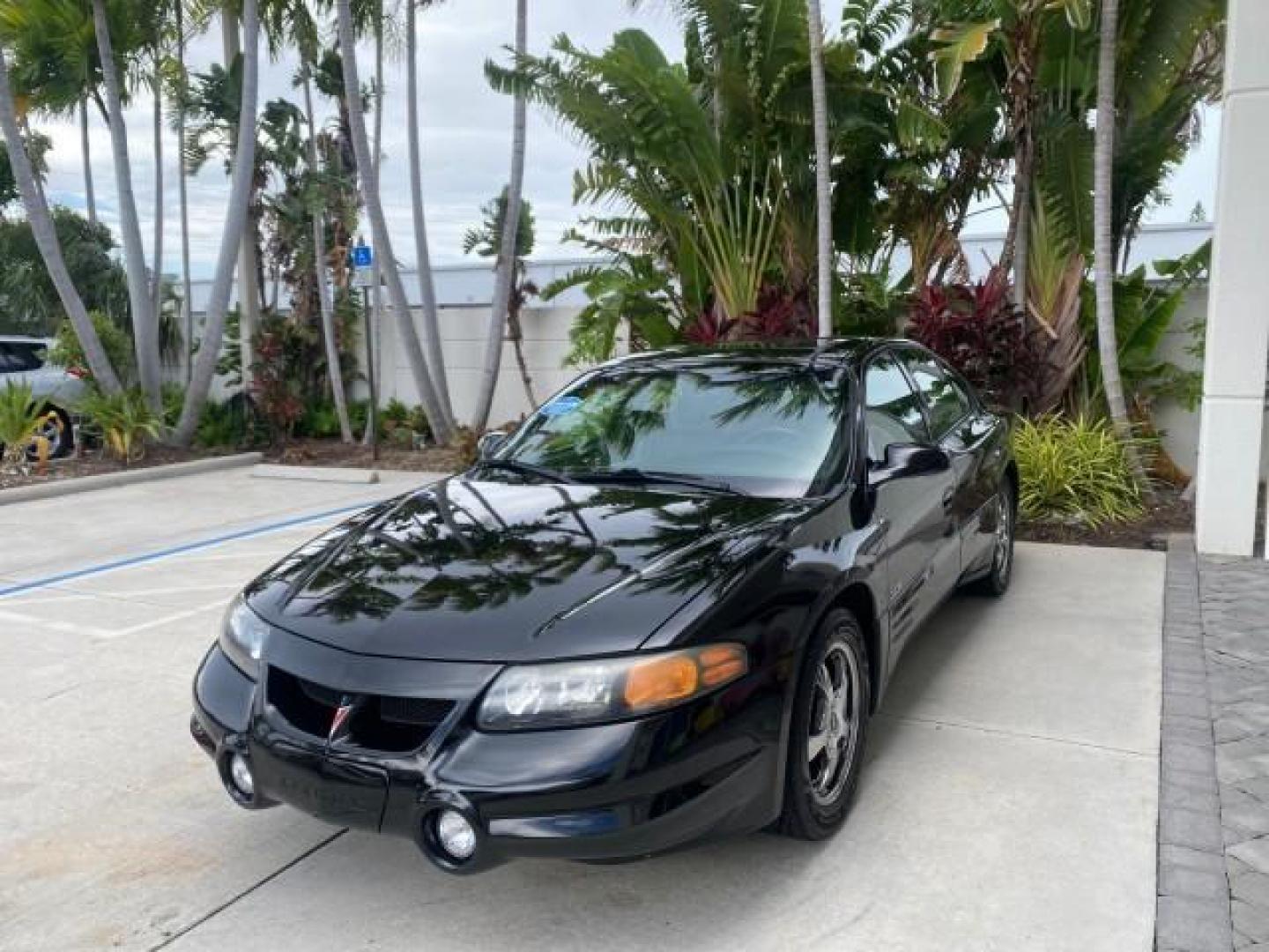 2002 Black /Dark Pewter Pontiac Bonneville SLE LOW MILES 82,619 (1G2HY54K224) with an 3.8L SFI V6 3800 Series II Engine engine, Automatic transmission, located at 4701 North Dixie Hwy, Pompano Beach, FL, 33064, (954) 422-2889, 26.240938, -80.123474 - OUR WEBPAGE FLORIDACARS1.COM HAS OVER 100 PHOTOS AND FREE CARFAX LINK 2002 PONTIAC BONNEVILLE SLE VIN: 1G2HY54K224170512 1 G 2 H Y 5 4 K 2 2 4 1 7 0 5 1 2 SEDAN 4 DR 3.8L V6 F GASOLINE FRONT WHEEL DRIVE Top Features Alloy Wheels Front Seat Heaters Leather Seats Sunroof(s) Basic Features ABS Brakes A - Photo#3
