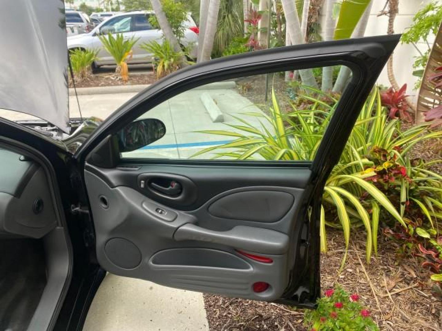 2002 Black /Dark Pewter Pontiac Bonneville SLE LOW MILES 82,619 (1G2HY54K224) with an 3.8L SFI V6 3800 Series II Engine engine, Automatic transmission, located at 4701 North Dixie Hwy, Pompano Beach, FL, 33064, (954) 422-2889, 26.240938, -80.123474 - OUR WEBPAGE FLORIDACARS1.COM HAS OVER 100 PHOTOS AND FREE CARFAX LINK 2002 PONTIAC BONNEVILLE SLE VIN: 1G2HY54K224170512 1 G 2 H Y 5 4 K 2 2 4 1 7 0 5 1 2 SEDAN 4 DR 3.8L V6 F GASOLINE FRONT WHEEL DRIVE Top Features Alloy Wheels Front Seat Heaters Leather Seats Sunroof(s) Basic Features ABS Brakes A - Photo#11