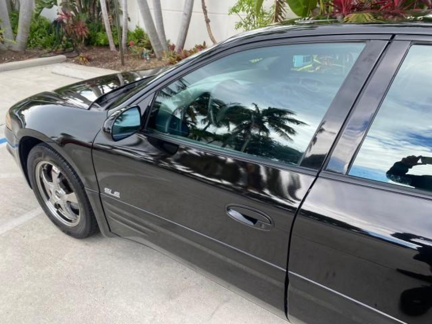 2002 Black /Dark Pewter Pontiac Bonneville SLE LOW MILES 82,619 (1G2HY54K224) with an 3.8L SFI V6 3800 Series II Engine engine, Automatic transmission, located at 4701 North Dixie Hwy, Pompano Beach, FL, 33064, (954) 422-2889, 26.240938, -80.123474 - OUR WEBPAGE FLORIDACARS1.COM HAS OVER 100 PHOTOS AND FREE CARFAX LINK 2002 PONTIAC BONNEVILLE SLE VIN: 1G2HY54K224170512 1 G 2 H Y 5 4 K 2 2 4 1 7 0 5 1 2 SEDAN 4 DR 3.8L V6 F GASOLINE FRONT WHEEL DRIVE Top Features Alloy Wheels Front Seat Heaters Leather Seats Sunroof(s) Basic Features ABS Brakes A - Photo#25