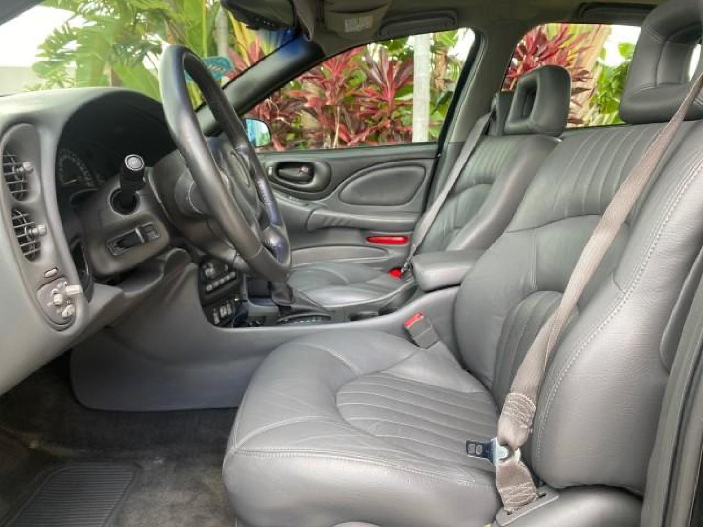 2002 Black /Dark Pewter Pontiac Bonneville SLE LOW MILES 82,619 (1G2HY54K224) with an 3.8L SFI V6 3800 Series II Engine engine, Automatic transmission, located at 4701 North Dixie Hwy, Pompano Beach, FL, 33064, (954) 422-2889, 26.240938, -80.123474 - OUR WEBPAGE FLORIDACARS1.COM HAS OVER 100 PHOTOS AND FREE CARFAX LINK 2002 PONTIAC BONNEVILLE SLE VIN: 1G2HY54K224170512 1 G 2 H Y 5 4 K 2 2 4 1 7 0 5 1 2 SEDAN 4 DR 3.8L V6 F GASOLINE FRONT WHEEL DRIVE Top Features Alloy Wheels Front Seat Heaters Leather Seats Sunroof(s) Basic Features ABS Brakes A - Photo#31