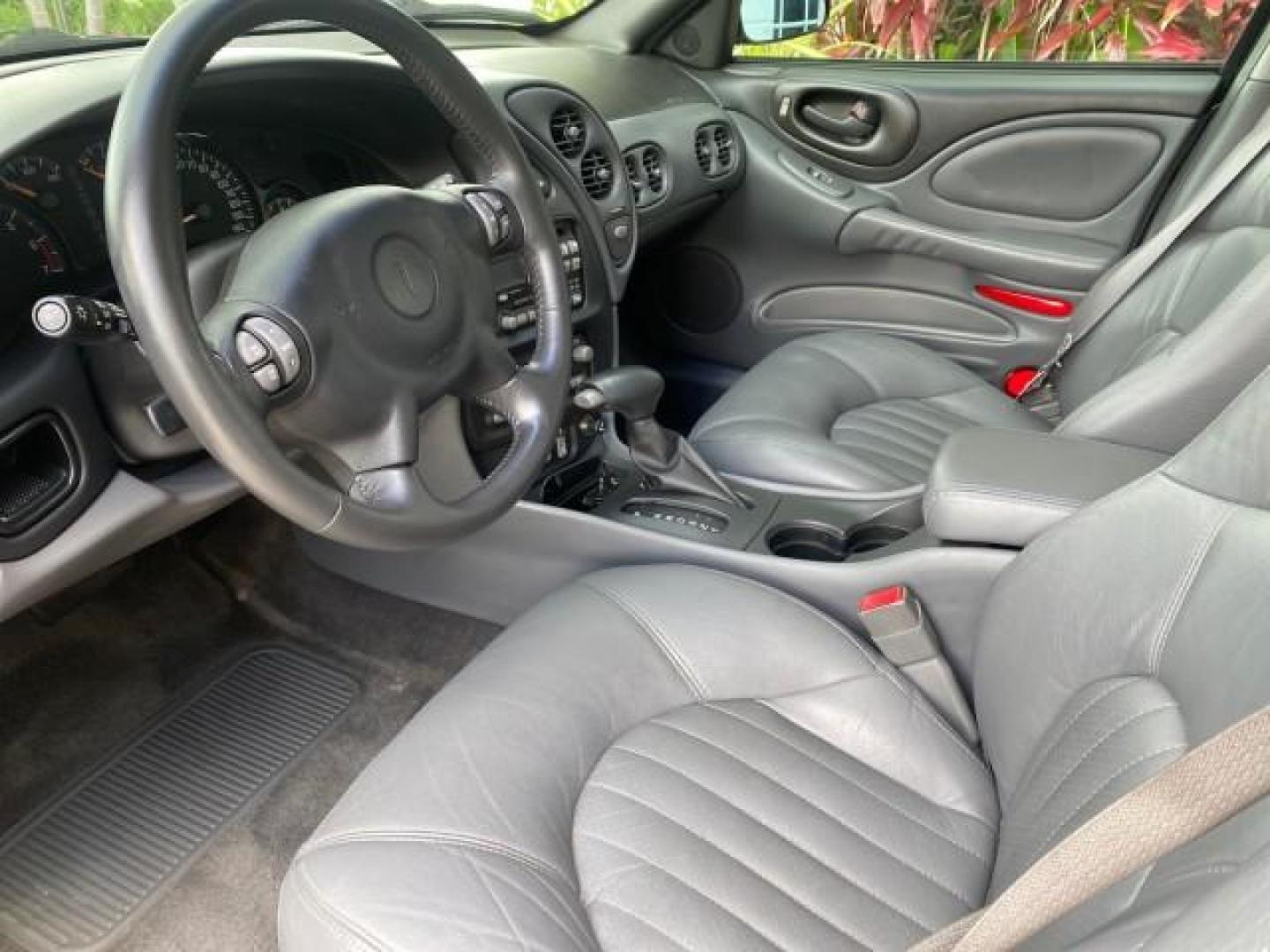 2002 Black /Dark Pewter Pontiac Bonneville SLE LOW MILES 82,619 (1G2HY54K224) with an 3.8L SFI V6 3800 Series II Engine engine, Automatic transmission, located at 4701 North Dixie Hwy, Pompano Beach, FL, 33064, (954) 422-2889, 26.240938, -80.123474 - OUR WEBPAGE FLORIDACARS1.COM HAS OVER 100 PHOTOS AND FREE CARFAX LINK 2002 PONTIAC BONNEVILLE SLE VIN: 1G2HY54K224170512 1 G 2 H Y 5 4 K 2 2 4 1 7 0 5 1 2 SEDAN 4 DR 3.8L V6 F GASOLINE FRONT WHEEL DRIVE Top Features Alloy Wheels Front Seat Heaters Leather Seats Sunroof(s) Basic Features ABS Brakes A - Photo#33