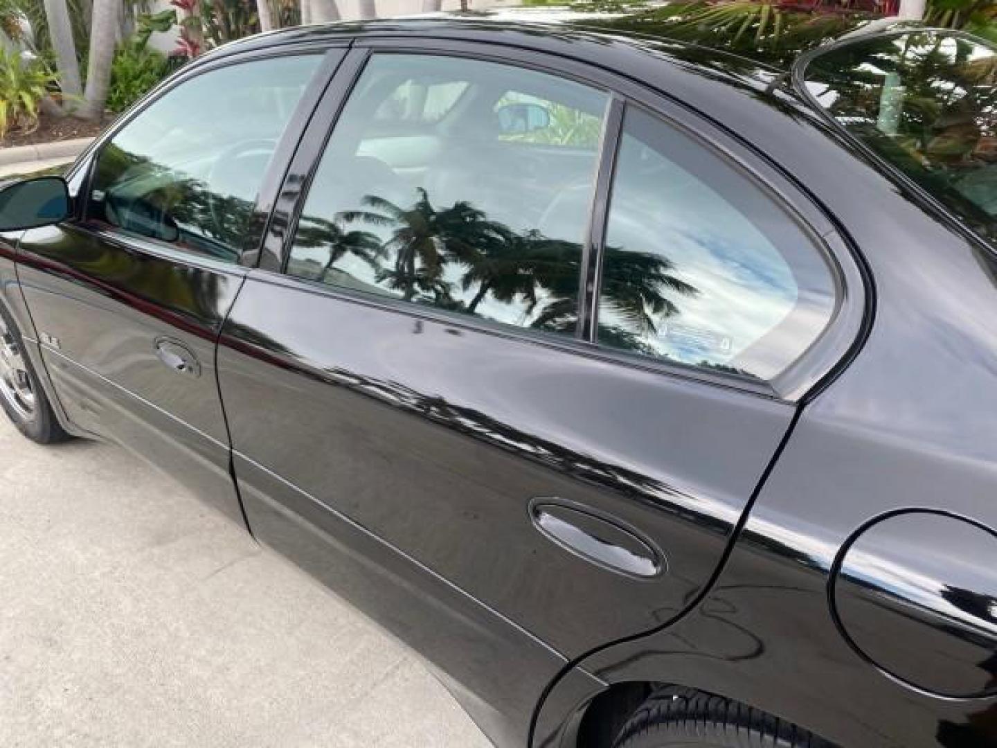 2002 Black /Dark Pewter Pontiac Bonneville SLE LOW MILES 82,619 (1G2HY54K224) with an 3.8L SFI V6 3800 Series II Engine engine, Automatic transmission, located at 4701 North Dixie Hwy, Pompano Beach, FL, 33064, (954) 422-2889, 26.240938, -80.123474 - OUR WEBPAGE FLORIDACARS1.COM HAS OVER 100 PHOTOS AND FREE CARFAX LINK 2002 PONTIAC BONNEVILLE SLE VIN: 1G2HY54K224170512 1 G 2 H Y 5 4 K 2 2 4 1 7 0 5 1 2 SEDAN 4 DR 3.8L V6 F GASOLINE FRONT WHEEL DRIVE Top Features Alloy Wheels Front Seat Heaters Leather Seats Sunroof(s) Basic Features ABS Brakes A - Photo#60
