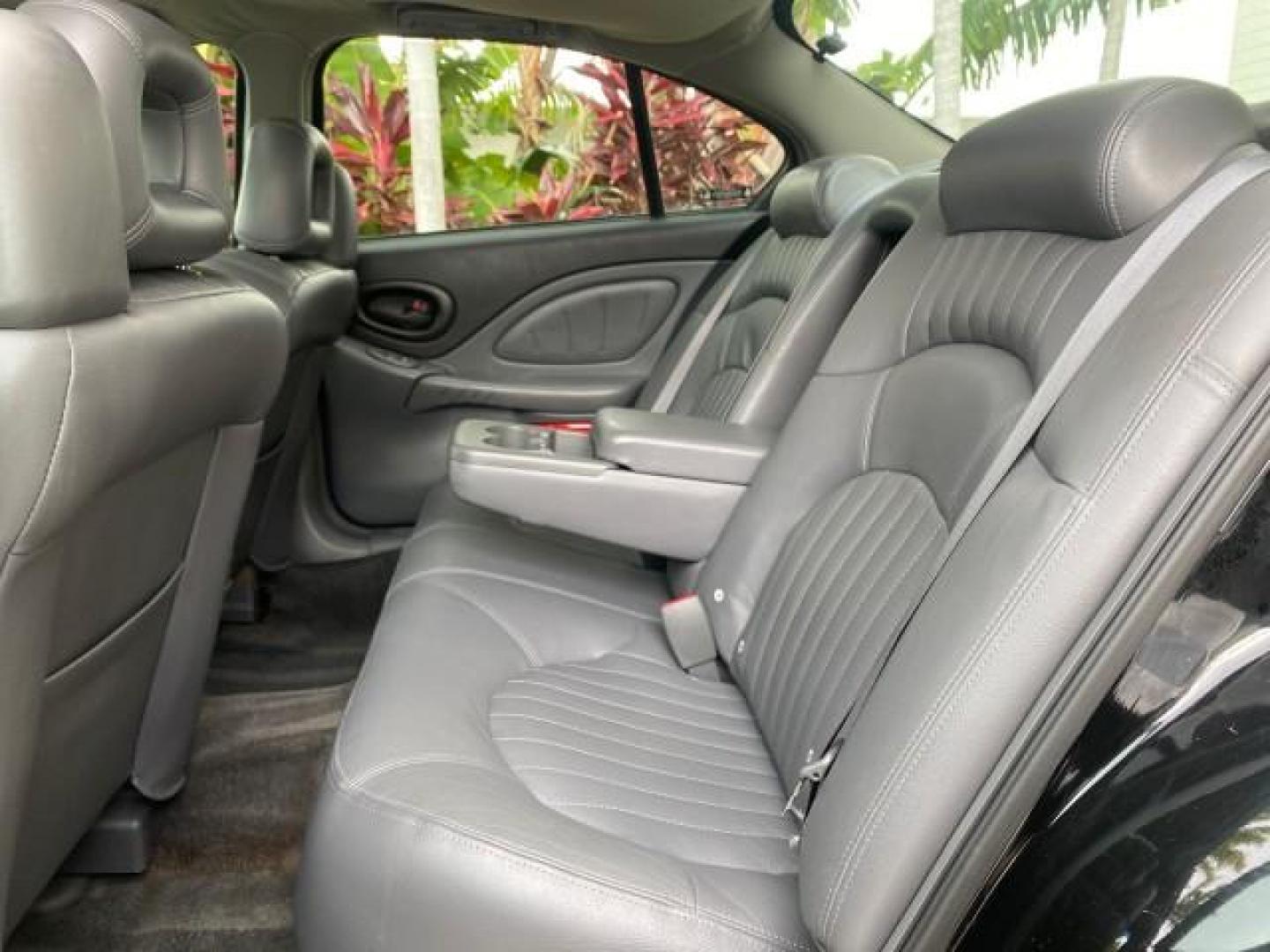 2002 Black /Dark Pewter Pontiac Bonneville SLE LOW MILES 82,619 (1G2HY54K224) with an 3.8L SFI V6 3800 Series II Engine engine, Automatic transmission, located at 4701 North Dixie Hwy, Pompano Beach, FL, 33064, (954) 422-2889, 26.240938, -80.123474 - OUR WEBPAGE FLORIDACARS1.COM HAS OVER 100 PHOTOS AND FREE CARFAX LINK 2002 PONTIAC BONNEVILLE SLE VIN: 1G2HY54K224170512 1 G 2 H Y 5 4 K 2 2 4 1 7 0 5 1 2 SEDAN 4 DR 3.8L V6 F GASOLINE FRONT WHEEL DRIVE Top Features Alloy Wheels Front Seat Heaters Leather Seats Sunroof(s) Basic Features ABS Brakes A - Photo#63