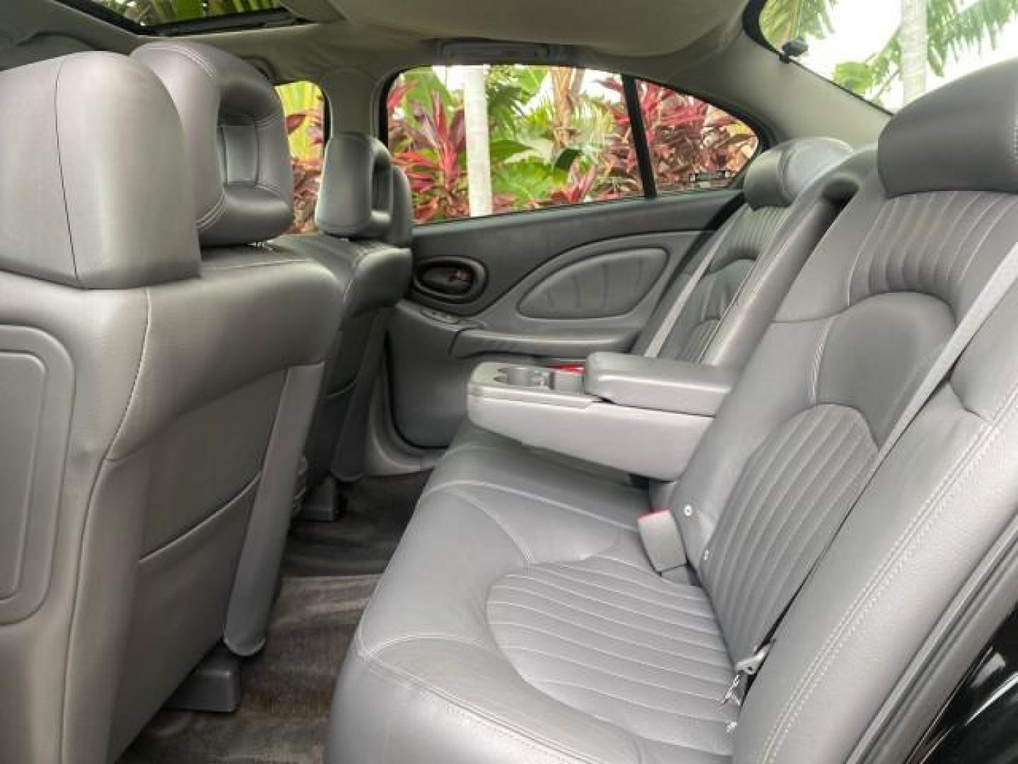 2002 Black /Dark Pewter Pontiac Bonneville SLE LOW MILES 82,619 (1G2HY54K224) with an 3.8L SFI V6 3800 Series II Engine engine, Automatic transmission, located at 4701 North Dixie Hwy, Pompano Beach, FL, 33064, (954) 422-2889, 26.240938, -80.123474 - OUR WEBPAGE FLORIDACARS1.COM HAS OVER 100 PHOTOS AND FREE CARFAX LINK 2002 PONTIAC BONNEVILLE SLE VIN: 1G2HY54K224170512 1 G 2 H Y 5 4 K 2 2 4 1 7 0 5 1 2 SEDAN 4 DR 3.8L V6 F GASOLINE FRONT WHEEL DRIVE Top Features Alloy Wheels Front Seat Heaters Leather Seats Sunroof(s) Basic Features ABS Brakes A - Photo#64
