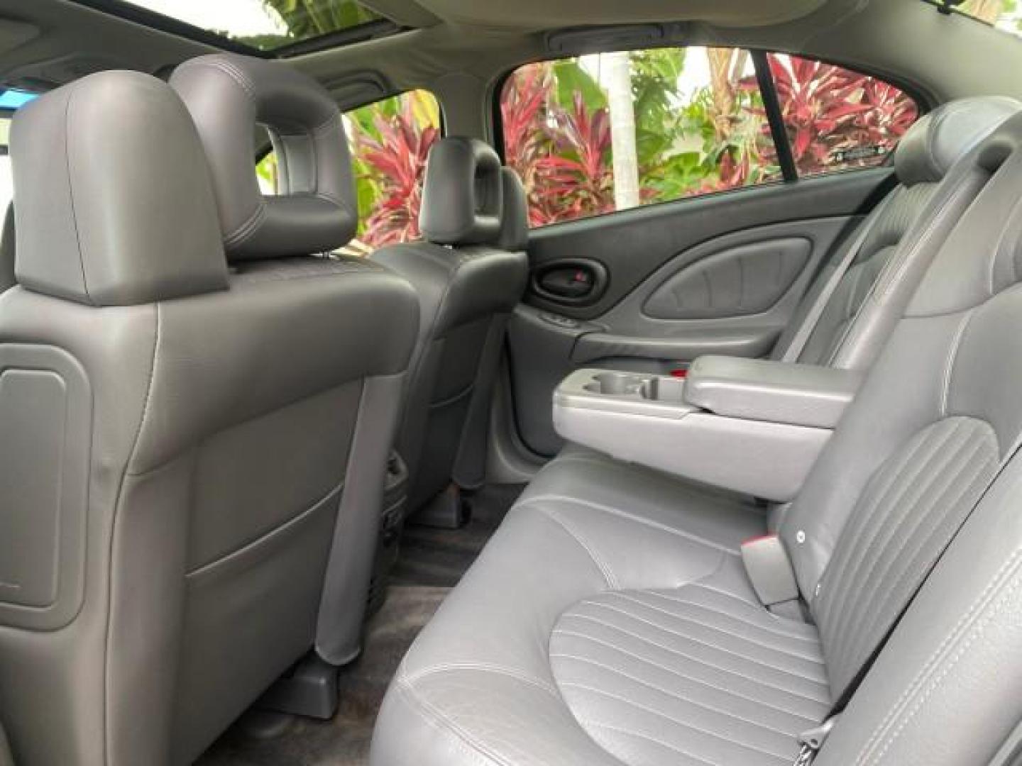 2002 Black /Dark Pewter Pontiac Bonneville SLE LOW MILES 82,619 (1G2HY54K224) with an 3.8L SFI V6 3800 Series II Engine engine, Automatic transmission, located at 4701 North Dixie Hwy, Pompano Beach, FL, 33064, (954) 422-2889, 26.240938, -80.123474 - OUR WEBPAGE FLORIDACARS1.COM HAS OVER 100 PHOTOS AND FREE CARFAX LINK 2002 PONTIAC BONNEVILLE SLE VIN: 1G2HY54K224170512 1 G 2 H Y 5 4 K 2 2 4 1 7 0 5 1 2 SEDAN 4 DR 3.8L V6 F GASOLINE FRONT WHEEL DRIVE Top Features Alloy Wheels Front Seat Heaters Leather Seats Sunroof(s) Basic Features ABS Brakes A - Photo#65