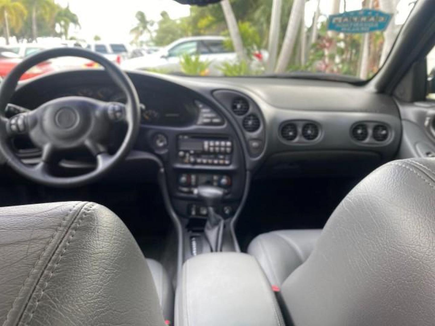 2002 Black /Dark Pewter Pontiac Bonneville SLE LOW MILES 82,619 (1G2HY54K224) with an 3.8L SFI V6 3800 Series II Engine engine, Automatic transmission, located at 4701 North Dixie Hwy, Pompano Beach, FL, 33064, (954) 422-2889, 26.240938, -80.123474 - OUR WEBPAGE FLORIDACARS1.COM HAS OVER 100 PHOTOS AND FREE CARFAX LINK 2002 PONTIAC BONNEVILLE SLE VIN: 1G2HY54K224170512 1 G 2 H Y 5 4 K 2 2 4 1 7 0 5 1 2 SEDAN 4 DR 3.8L V6 F GASOLINE FRONT WHEEL DRIVE Top Features Alloy Wheels Front Seat Heaters Leather Seats Sunroof(s) Basic Features ABS Brakes A - Photo#67