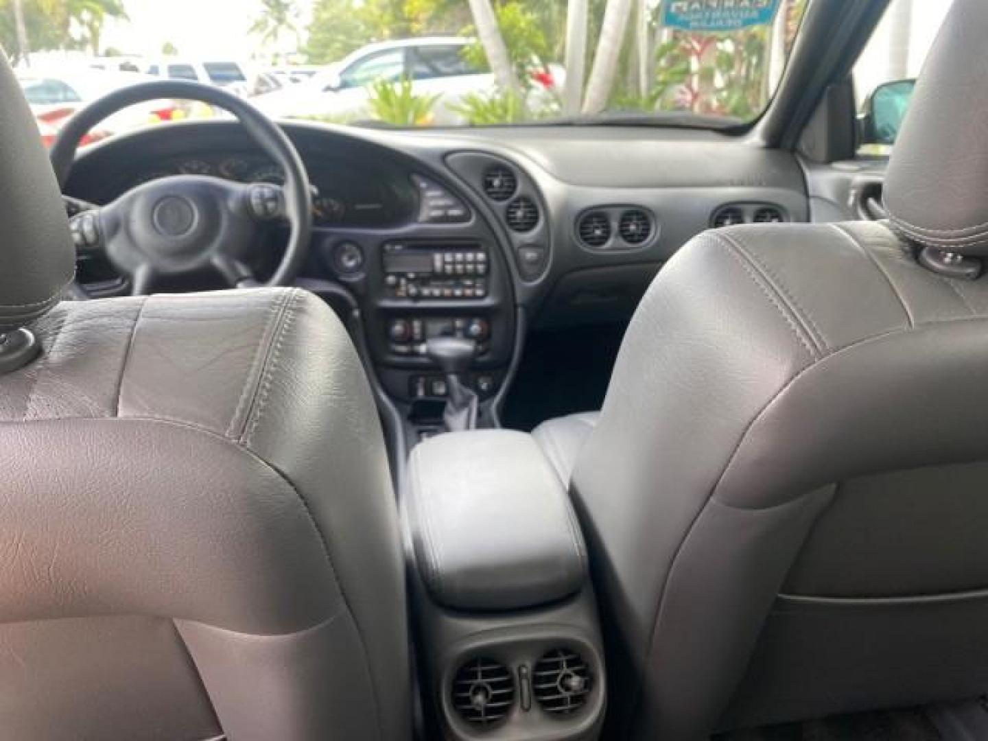 2002 Black /Dark Pewter Pontiac Bonneville SLE LOW MILES 82,619 (1G2HY54K224) with an 3.8L SFI V6 3800 Series II Engine engine, Automatic transmission, located at 4701 North Dixie Hwy, Pompano Beach, FL, 33064, (954) 422-2889, 26.240938, -80.123474 - OUR WEBPAGE FLORIDACARS1.COM HAS OVER 100 PHOTOS AND FREE CARFAX LINK 2002 PONTIAC BONNEVILLE SLE VIN: 1G2HY54K224170512 1 G 2 H Y 5 4 K 2 2 4 1 7 0 5 1 2 SEDAN 4 DR 3.8L V6 F GASOLINE FRONT WHEEL DRIVE Top Features Alloy Wheels Front Seat Heaters Leather Seats Sunroof(s) Basic Features ABS Brakes A - Photo#68