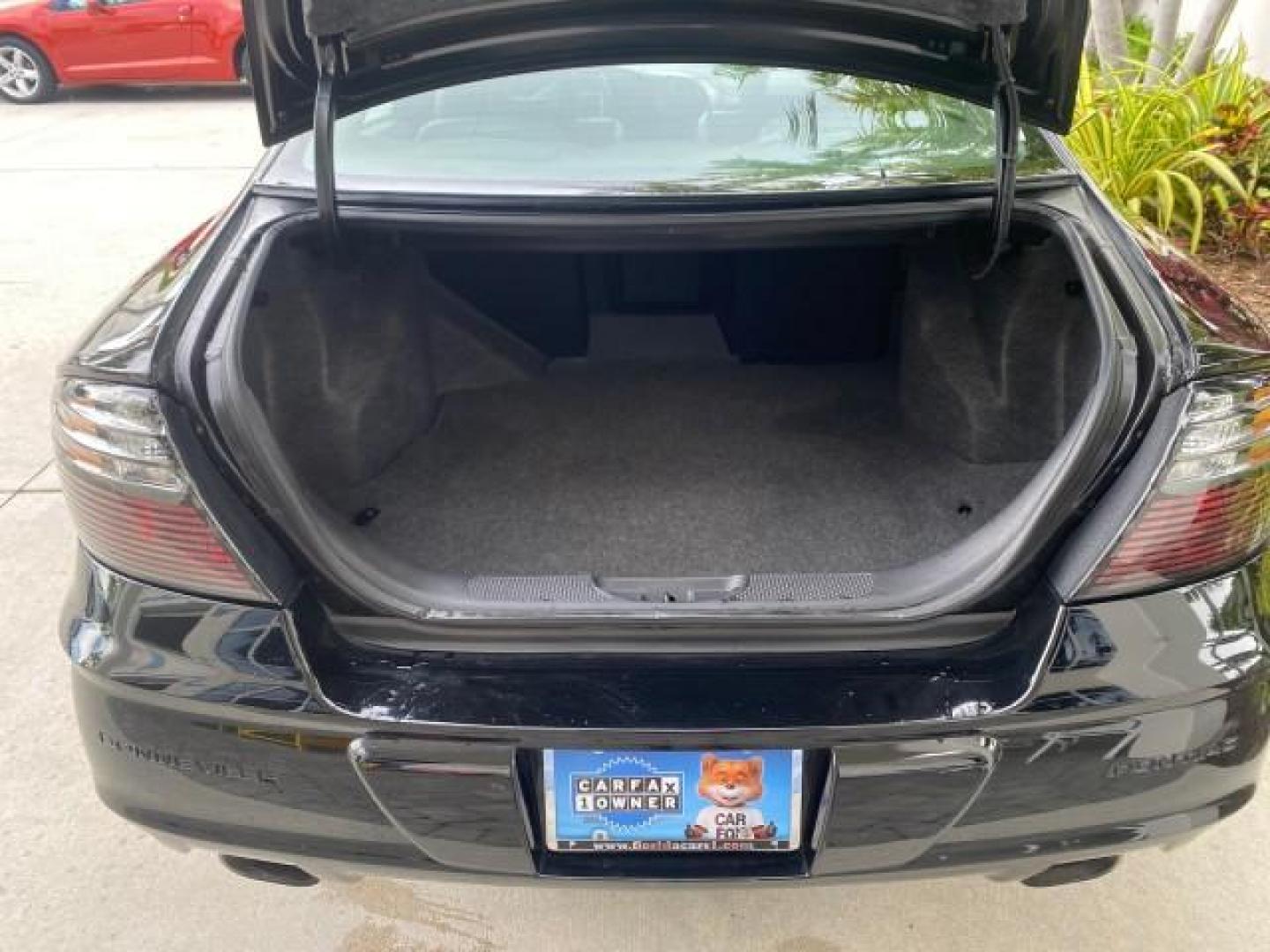 2002 Black /Dark Pewter Pontiac Bonneville SLE LOW MILES 82,619 (1G2HY54K224) with an 3.8L SFI V6 3800 Series II Engine engine, Automatic transmission, located at 4701 North Dixie Hwy, Pompano Beach, FL, 33064, (954) 422-2889, 26.240938, -80.123474 - OUR WEBPAGE FLORIDACARS1.COM HAS OVER 100 PHOTOS AND FREE CARFAX LINK 2002 PONTIAC BONNEVILLE SLE VIN: 1G2HY54K224170512 1 G 2 H Y 5 4 K 2 2 4 1 7 0 5 1 2 SEDAN 4 DR 3.8L V6 F GASOLINE FRONT WHEEL DRIVE Top Features Alloy Wheels Front Seat Heaters Leather Seats Sunroof(s) Basic Features ABS Brakes A - Photo#83