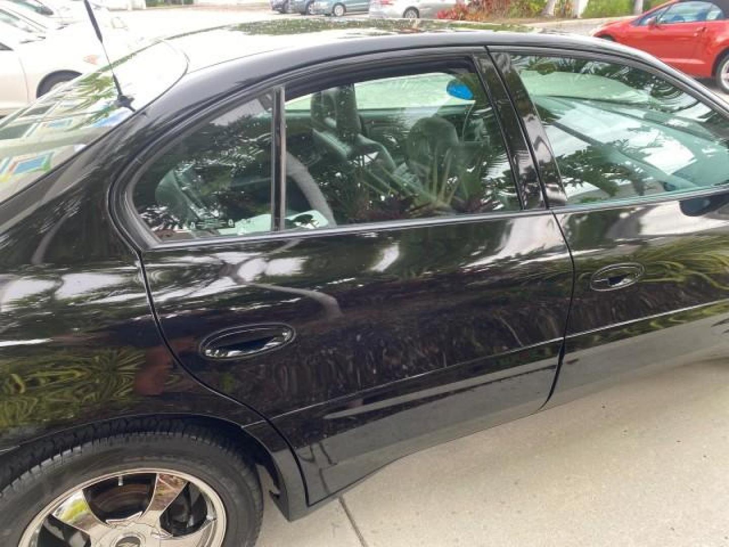2002 Black /Dark Pewter Pontiac Bonneville SLE LOW MILES 82,619 (1G2HY54K224) with an 3.8L SFI V6 3800 Series II Engine engine, Automatic transmission, located at 4701 North Dixie Hwy, Pompano Beach, FL, 33064, (954) 422-2889, 26.240938, -80.123474 - OUR WEBPAGE FLORIDACARS1.COM HAS OVER 100 PHOTOS AND FREE CARFAX LINK 2002 PONTIAC BONNEVILLE SLE VIN: 1G2HY54K224170512 1 G 2 H Y 5 4 K 2 2 4 1 7 0 5 1 2 SEDAN 4 DR 3.8L V6 F GASOLINE FRONT WHEEL DRIVE Top Features Alloy Wheels Front Seat Heaters Leather Seats Sunroof(s) Basic Features ABS Brakes A - Photo#88