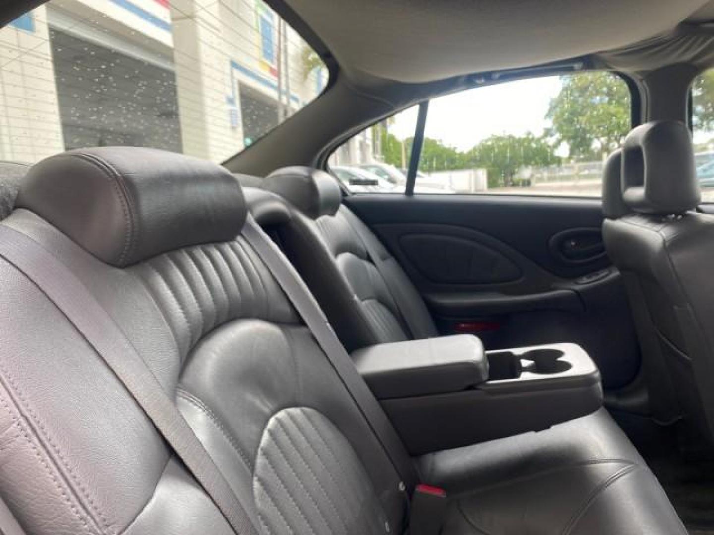 2002 Black /Dark Pewter Pontiac Bonneville SLE LOW MILES 82,619 (1G2HY54K224) with an 3.8L SFI V6 3800 Series II Engine engine, Automatic transmission, located at 4701 North Dixie Hwy, Pompano Beach, FL, 33064, (954) 422-2889, 26.240938, -80.123474 - OUR WEBPAGE FLORIDACARS1.COM HAS OVER 100 PHOTOS AND FREE CARFAX LINK 2002 PONTIAC BONNEVILLE SLE VIN: 1G2HY54K224170512 1 G 2 H Y 5 4 K 2 2 4 1 7 0 5 1 2 SEDAN 4 DR 3.8L V6 F GASOLINE FRONT WHEEL DRIVE Top Features Alloy Wheels Front Seat Heaters Leather Seats Sunroof(s) Basic Features ABS Brakes A - Photo#90