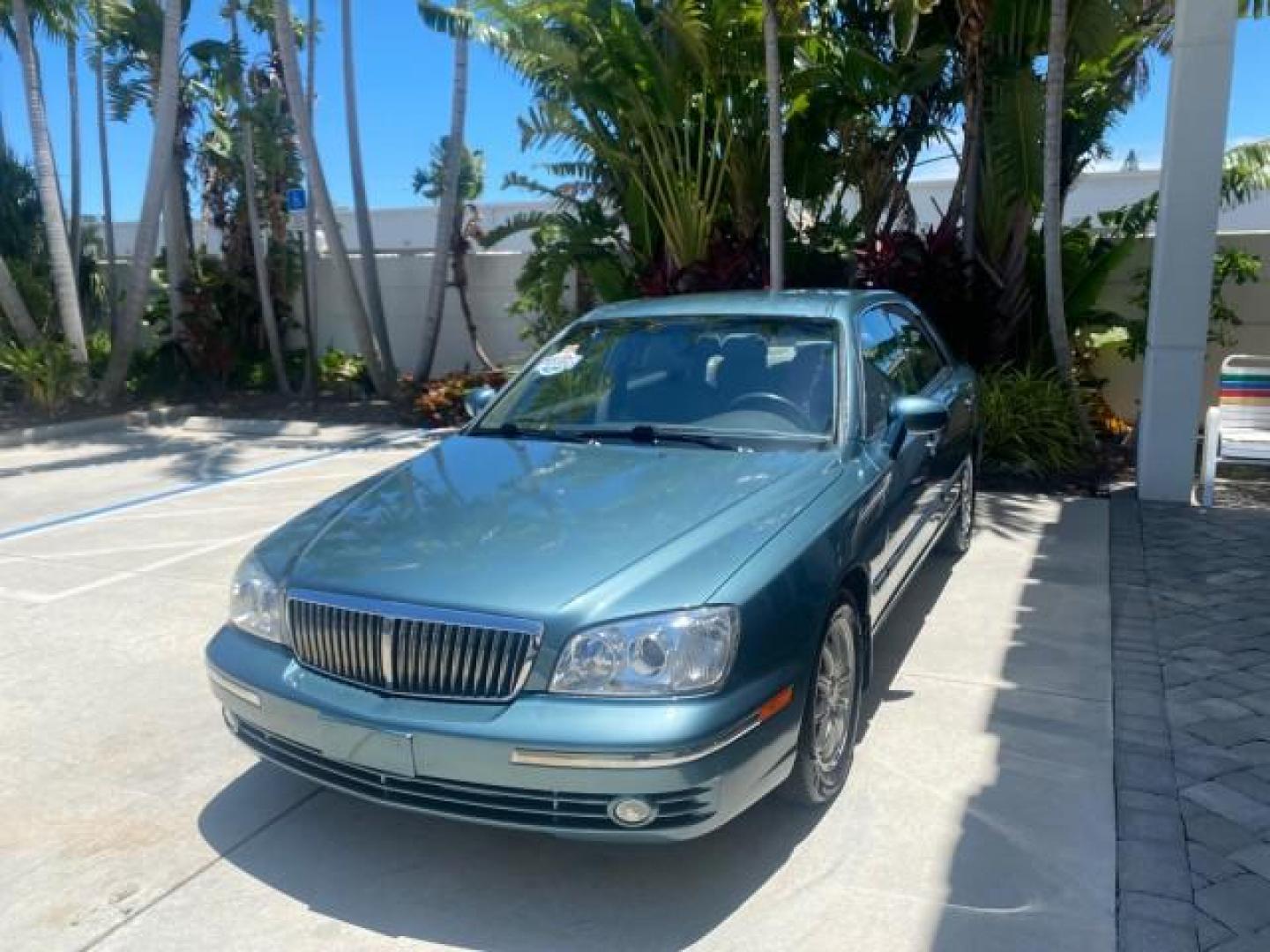 2005 Celadon Green /Beige Hyundai XG350 LOW MILES 46,921 1 OWNER (KMHFU45E55A) with an 3.5L DOHC MPI 24-Valve V6 Engine engine, Automatic transmission, located at 4701 North Dixie Hwy, Pompano Beach, FL, 33064, (954) 422-2889, 26.240938, -80.123474 - OUR WEBPAGE FLORIDACARS1.COM HAS OVER 100 PHOTOS AND FREE CARFAX LINK 2005 HYUNDAI XG350 VIN: KMHFU45E55A380931 K M H F U 4 5 E 5 5 A 3 8 0 9 3 1 SEDAN 4 DR 3.5L V6 F DOHC 24V GASOLINE FRONT WHEEL DRIVE Top Features Alloy Wheels Leather Seats Basic Features ABS Brakes AM/FM Stereo Air Conditioning A - Photo#3