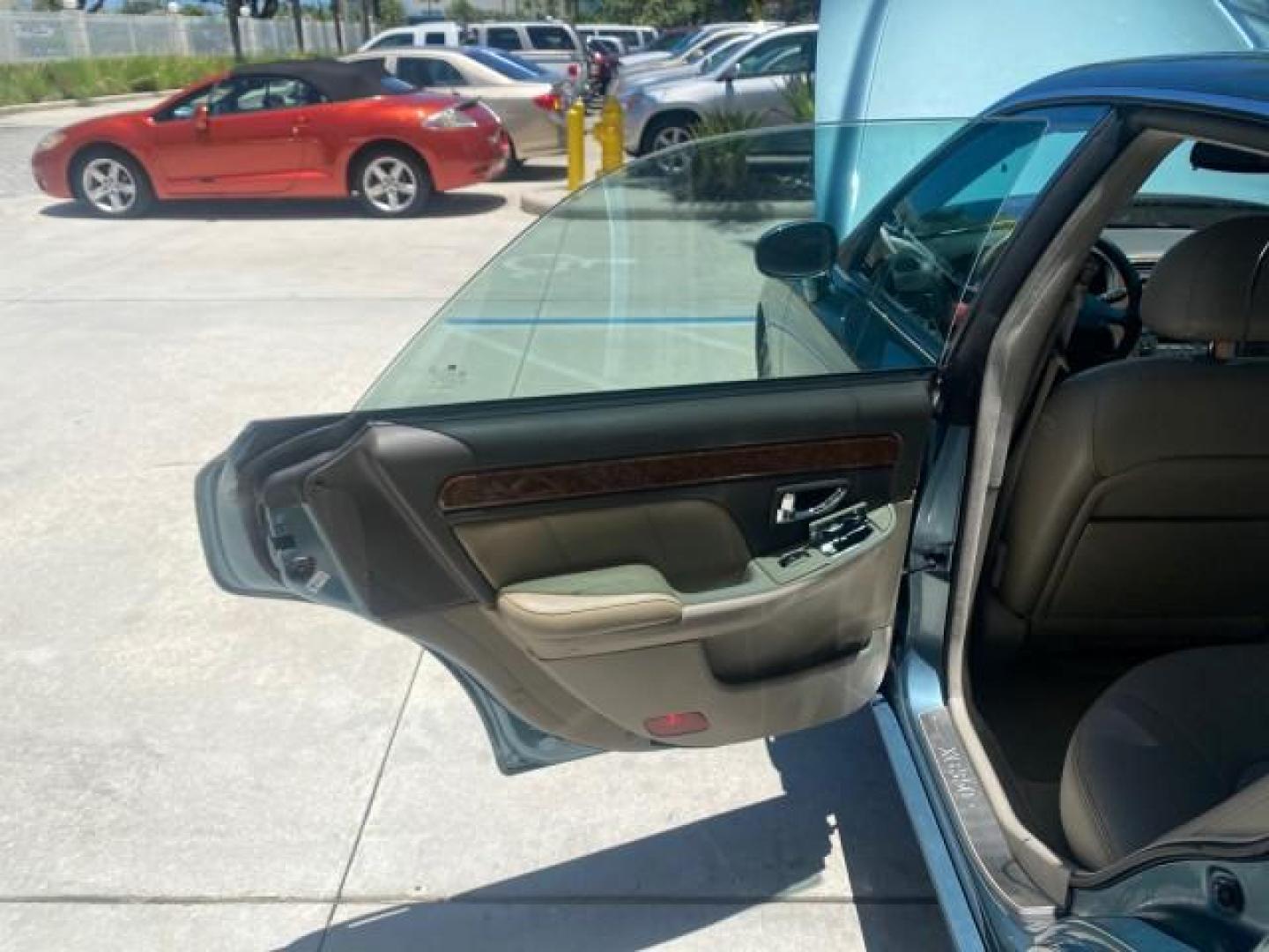 2005 Celadon Green /Beige Hyundai XG350 LOW MILES 46,921 1 OWNER (KMHFU45E55A) with an 3.5L DOHC MPI 24-Valve V6 Engine engine, Automatic transmission, located at 4701 North Dixie Hwy, Pompano Beach, FL, 33064, (954) 422-2889, 26.240938, -80.123474 - OUR WEBPAGE FLORIDACARS1.COM HAS OVER 100 PHOTOS AND FREE CARFAX LINK 2005 HYUNDAI XG350 VIN: KMHFU45E55A380931 K M H F U 4 5 E 5 5 A 3 8 0 9 3 1 SEDAN 4 DR 3.5L V6 F DOHC 24V GASOLINE FRONT WHEEL DRIVE Top Features Alloy Wheels Leather Seats Basic Features ABS Brakes AM/FM Stereo Air Conditioning A - Photo#13
