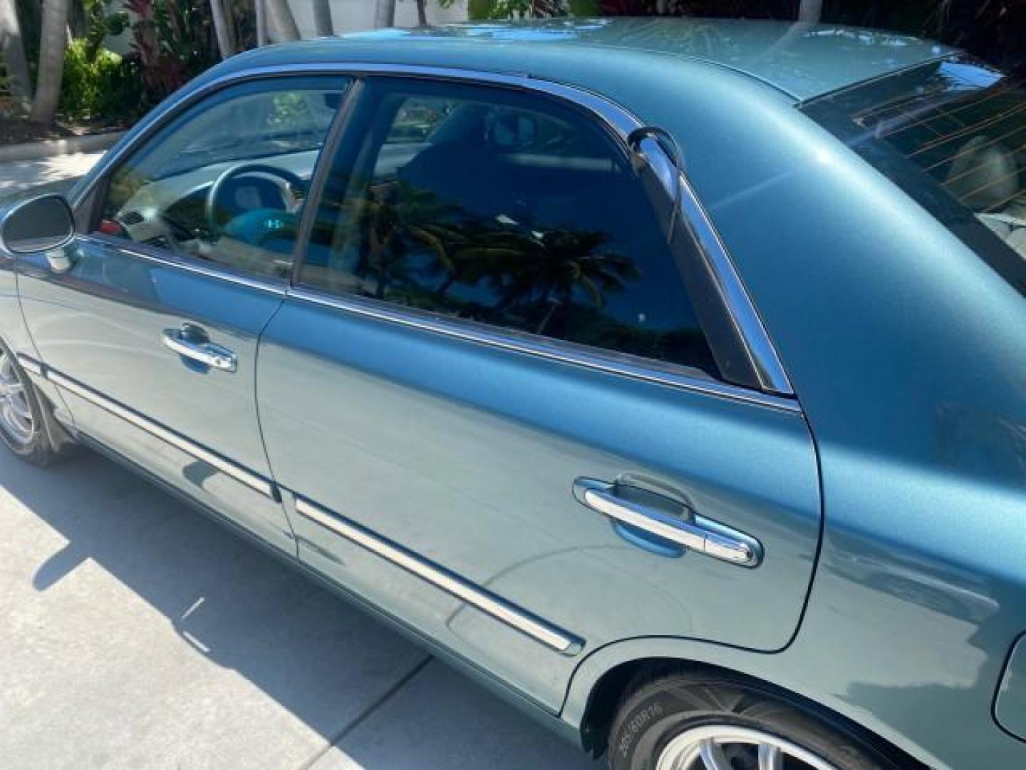2005 Celadon Green /Beige Hyundai XG350 LOW MILES 46,921 1 OWNER (KMHFU45E55A) with an 3.5L DOHC MPI 24-Valve V6 Engine engine, Automatic transmission, located at 4701 North Dixie Hwy, Pompano Beach, FL, 33064, (954) 422-2889, 26.240938, -80.123474 - OUR WEBPAGE FLORIDACARS1.COM HAS OVER 100 PHOTOS AND FREE CARFAX LINK 2005 HYUNDAI XG350 VIN: KMHFU45E55A380931 K M H F U 4 5 E 5 5 A 3 8 0 9 3 1 SEDAN 4 DR 3.5L V6 F DOHC 24V GASOLINE FRONT WHEEL DRIVE Top Features Alloy Wheels Leather Seats Basic Features ABS Brakes AM/FM Stereo Air Conditioning A - Photo#62