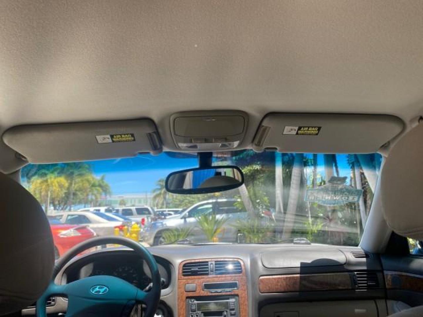 2005 Celadon Green /Beige Hyundai XG350 LOW MILES 46,921 1 OWNER (KMHFU45E55A) with an 3.5L DOHC MPI 24-Valve V6 Engine engine, Automatic transmission, located at 4701 North Dixie Hwy, Pompano Beach, FL, 33064, (954) 422-2889, 26.240938, -80.123474 - OUR WEBPAGE FLORIDACARS1.COM HAS OVER 100 PHOTOS AND FREE CARFAX LINK 2005 HYUNDAI XG350 VIN: KMHFU45E55A380931 K M H F U 4 5 E 5 5 A 3 8 0 9 3 1 SEDAN 4 DR 3.5L V6 F DOHC 24V GASOLINE FRONT WHEEL DRIVE Top Features Alloy Wheels Leather Seats Basic Features ABS Brakes AM/FM Stereo Air Conditioning A - Photo#71