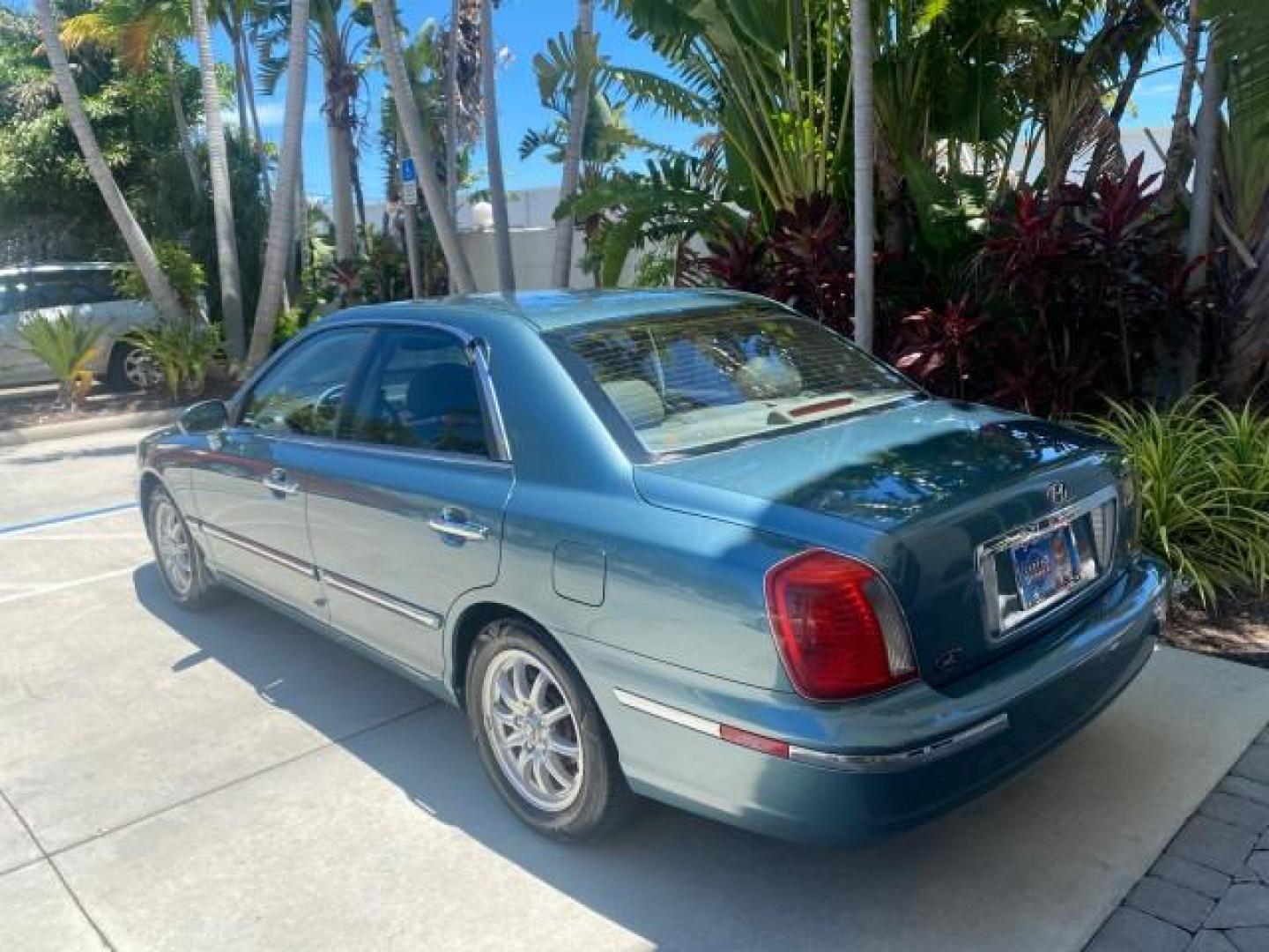 2005 Celadon Green /Beige Hyundai XG350 LOW MILES 46,921 1 OWNER (KMHFU45E55A) with an 3.5L DOHC MPI 24-Valve V6 Engine engine, Automatic transmission, located at 4701 North Dixie Hwy, Pompano Beach, FL, 33064, (954) 422-2889, 26.240938, -80.123474 - OUR WEBPAGE FLORIDACARS1.COM HAS OVER 100 PHOTOS AND FREE CARFAX LINK 2005 HYUNDAI XG350 VIN: KMHFU45E55A380931 K M H F U 4 5 E 5 5 A 3 8 0 9 3 1 SEDAN 4 DR 3.5L V6 F DOHC 24V GASOLINE FRONT WHEEL DRIVE Top Features Alloy Wheels Leather Seats Basic Features ABS Brakes AM/FM Stereo Air Conditioning A - Photo#80