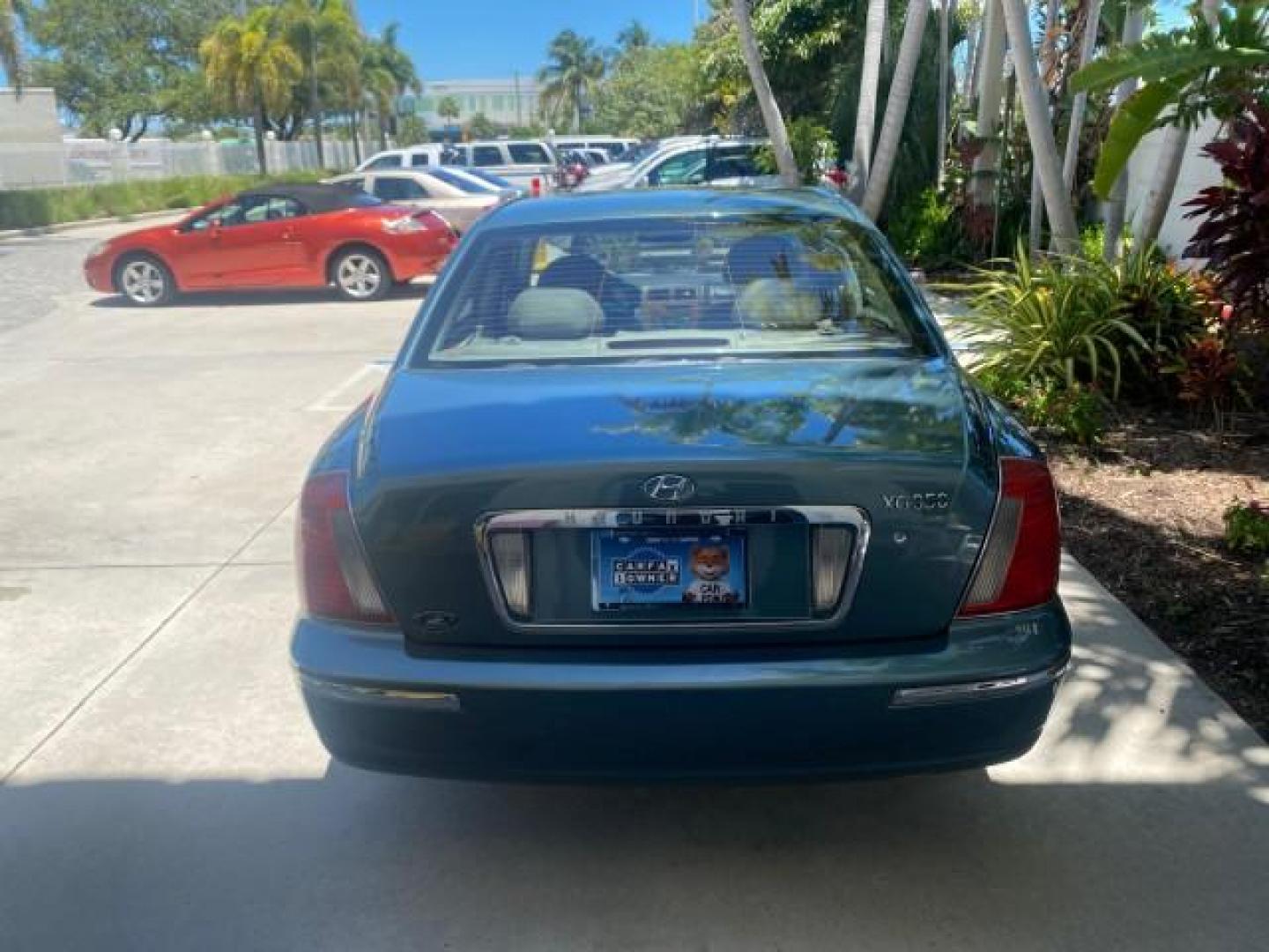 2005 Celadon Green /Beige Hyundai XG350 LOW MILES 46,921 1 OWNER (KMHFU45E55A) with an 3.5L DOHC MPI 24-Valve V6 Engine engine, Automatic transmission, located at 4701 North Dixie Hwy, Pompano Beach, FL, 33064, (954) 422-2889, 26.240938, -80.123474 - OUR WEBPAGE FLORIDACARS1.COM HAS OVER 100 PHOTOS AND FREE CARFAX LINK 2005 HYUNDAI XG350 VIN: KMHFU45E55A380931 K M H F U 4 5 E 5 5 A 3 8 0 9 3 1 SEDAN 4 DR 3.5L V6 F DOHC 24V GASOLINE FRONT WHEEL DRIVE Top Features Alloy Wheels Leather Seats Basic Features ABS Brakes AM/FM Stereo Air Conditioning A - Photo#81