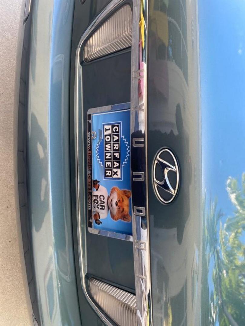 2005 Celadon Green /Beige Hyundai XG350 LOW MILES 46,921 1 OWNER (KMHFU45E55A) with an 3.5L DOHC MPI 24-Valve V6 Engine engine, Automatic transmission, located at 4701 North Dixie Hwy, Pompano Beach, FL, 33064, (954) 422-2889, 26.240938, -80.123474 - OUR WEBPAGE FLORIDACARS1.COM HAS OVER 100 PHOTOS AND FREE CARFAX LINK 2005 HYUNDAI XG350 VIN: KMHFU45E55A380931 K M H F U 4 5 E 5 5 A 3 8 0 9 3 1 SEDAN 4 DR 3.5L V6 F DOHC 24V GASOLINE FRONT WHEEL DRIVE Top Features Alloy Wheels Leather Seats Basic Features ABS Brakes AM/FM Stereo Air Conditioning A - Photo#83