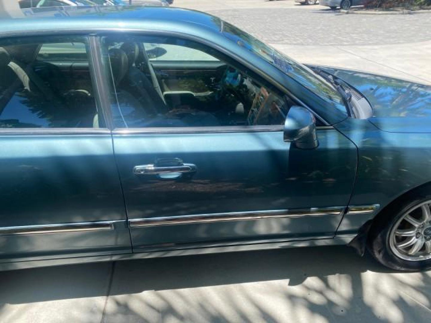 2005 Celadon Green /Beige Hyundai XG350 LOW MILES 46,921 1 OWNER (KMHFU45E55A) with an 3.5L DOHC MPI 24-Valve V6 Engine engine, Automatic transmission, located at 4701 North Dixie Hwy, Pompano Beach, FL, 33064, (954) 422-2889, 26.240938, -80.123474 - OUR WEBPAGE FLORIDACARS1.COM HAS OVER 100 PHOTOS AND FREE CARFAX LINK 2005 HYUNDAI XG350 VIN: KMHFU45E55A380931 K M H F U 4 5 E 5 5 A 3 8 0 9 3 1 SEDAN 4 DR 3.5L V6 F DOHC 24V GASOLINE FRONT WHEEL DRIVE Top Features Alloy Wheels Leather Seats Basic Features ABS Brakes AM/FM Stereo Air Conditioning A - Photo#99