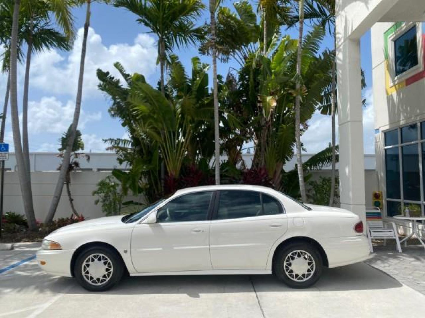 2003 White /Taupe Buick LeSabre Custom LOW MILES 32,880 1 OWNER (1G4HP54K63U) with an 3.8L 3800 V6 SFI Engine engine, Automatic transmission, located at 4701 North Dixie Hwy, Pompano Beach, FL, 33064, (954) 422-2889, 26.240938, -80.123474 - OUR WEBPAGE FLORIDACARS1.COM HAS OVER 100 PHOTOS AND FREE CARFAX LINK 2003 BUICK LESABRE CUSTOM VIN: 1G4HP54K63U139534 1 G 4 H P 5 4 K 6 3 U 1 3 9 5 3 4 SEDAN 4 DR 3.8L V6 F 12V 29 mpg GASOLINE FRONT WHEEL DRIVE Top Features Alloy Wheels Cloth Seats Leather Seats Luxury Package Basic Features ABS Br - Photo#4