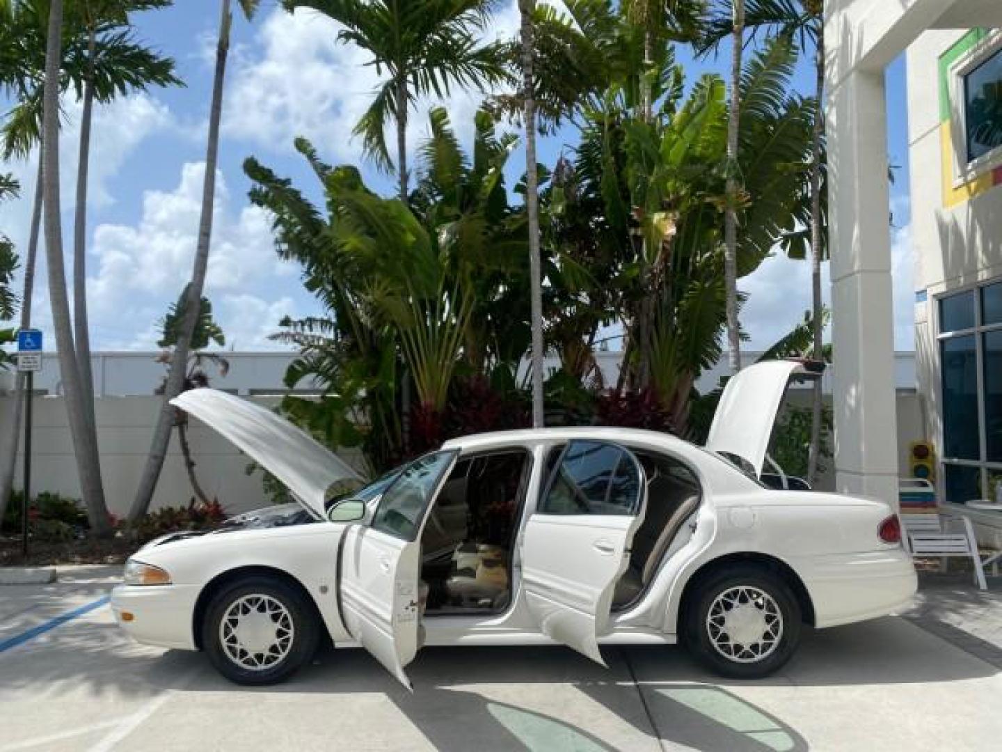 2003 White /Taupe Buick LeSabre Custom LOW MILES 32,880 1 OWNER (1G4HP54K63U) with an 3.8L 3800 V6 SFI Engine engine, Automatic transmission, located at 4701 North Dixie Hwy, Pompano Beach, FL, 33064, (954) 422-2889, 26.240938, -80.123474 - OUR WEBPAGE FLORIDACARS1.COM HAS OVER 100 PHOTOS AND FREE CARFAX LINK 2003 BUICK LESABRE CUSTOM VIN: 1G4HP54K63U139534 1 G 4 H P 5 4 K 6 3 U 1 3 9 5 3 4 SEDAN 4 DR 3.8L V6 F 12V 29 mpg GASOLINE FRONT WHEEL DRIVE Top Features Alloy Wheels Cloth Seats Leather Seats Luxury Package Basic Features ABS Br - Photo#8