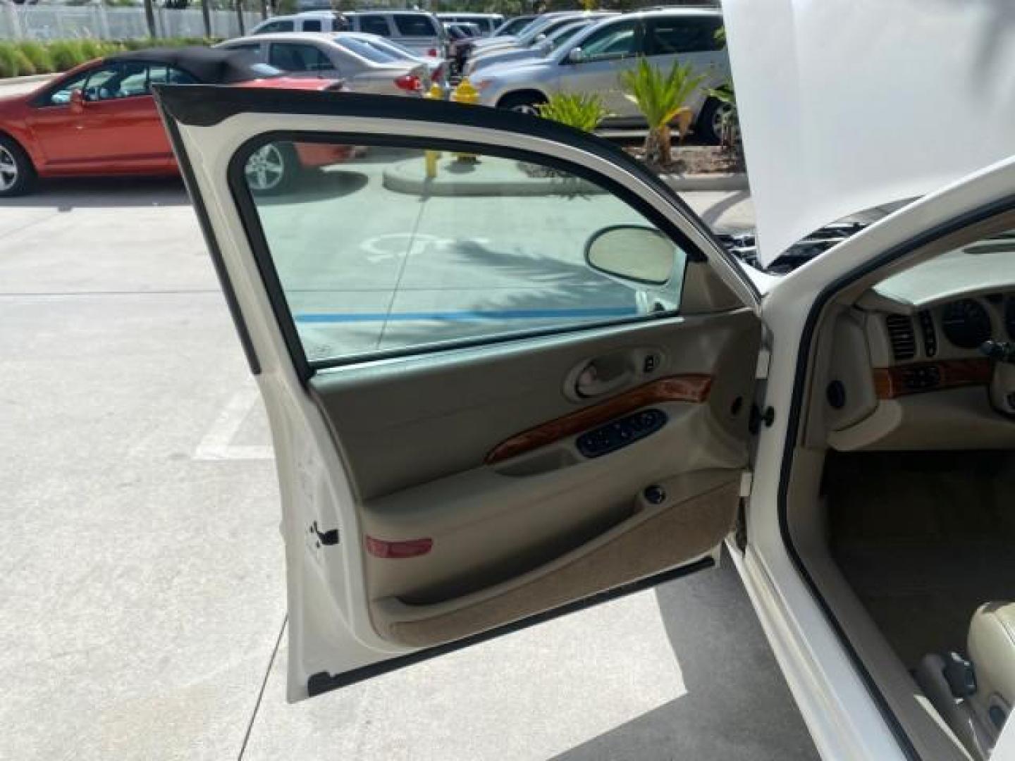 2003 White /Taupe Buick LeSabre Custom LOW MILES 32,880 1 OWNER (1G4HP54K63U) with an 3.8L 3800 V6 SFI Engine engine, Automatic transmission, located at 4701 North Dixie Hwy, Pompano Beach, FL, 33064, (954) 422-2889, 26.240938, -80.123474 - OUR WEBPAGE FLORIDACARS1.COM HAS OVER 100 PHOTOS AND FREE CARFAX LINK 2003 BUICK LESABRE CUSTOM VIN: 1G4HP54K63U139534 1 G 4 H P 5 4 K 6 3 U 1 3 9 5 3 4 SEDAN 4 DR 3.8L V6 F 12V 29 mpg GASOLINE FRONT WHEEL DRIVE Top Features Alloy Wheels Cloth Seats Leather Seats Luxury Package Basic Features ABS Br - Photo#9