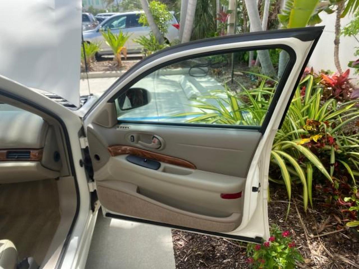 2003 White /Taupe Buick LeSabre Custom LOW MILES 32,880 1 OWNER (1G4HP54K63U) with an 3.8L 3800 V6 SFI Engine engine, Automatic transmission, located at 4701 North Dixie Hwy, Pompano Beach, FL, 33064, (954) 422-2889, 26.240938, -80.123474 - OUR WEBPAGE FLORIDACARS1.COM HAS OVER 100 PHOTOS AND FREE CARFAX LINK 2003 BUICK LESABRE CUSTOM VIN: 1G4HP54K63U139534 1 G 4 H P 5 4 K 6 3 U 1 3 9 5 3 4 SEDAN 4 DR 3.8L V6 F 12V 29 mpg GASOLINE FRONT WHEEL DRIVE Top Features Alloy Wheels Cloth Seats Leather Seats Luxury Package Basic Features ABS Br - Photo#11