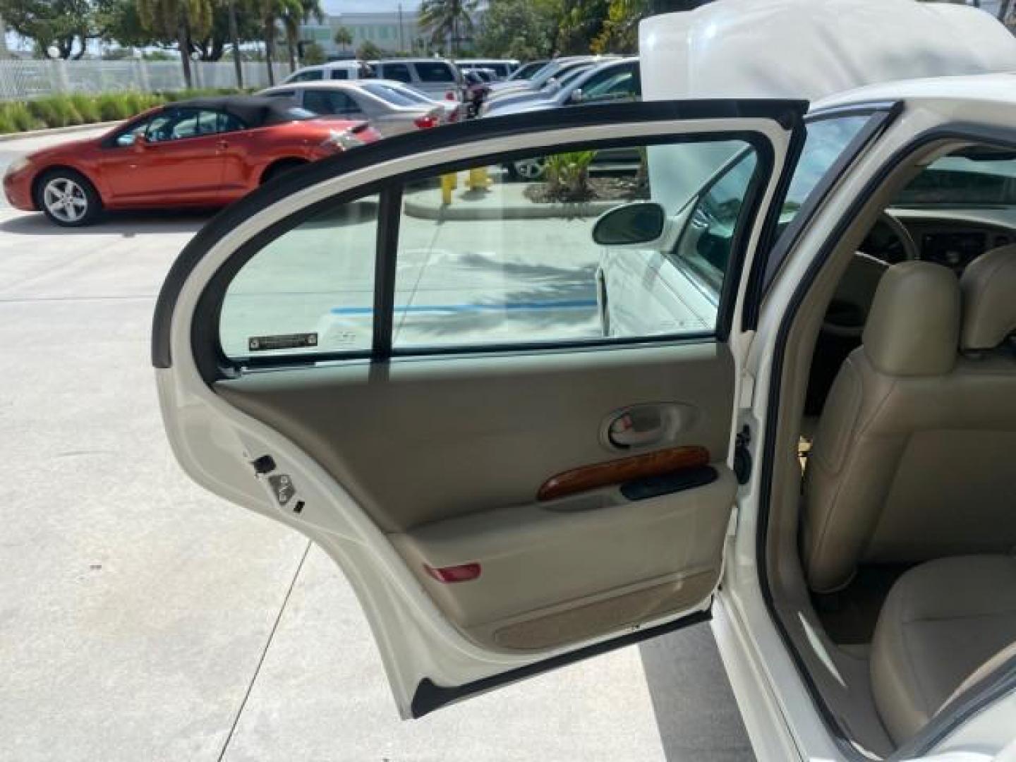 2003 White /Taupe Buick LeSabre Custom LOW MILES 32,880 1 OWNER (1G4HP54K63U) with an 3.8L 3800 V6 SFI Engine engine, Automatic transmission, located at 4701 North Dixie Hwy, Pompano Beach, FL, 33064, (954) 422-2889, 26.240938, -80.123474 - OUR WEBPAGE FLORIDACARS1.COM HAS OVER 100 PHOTOS AND FREE CARFAX LINK 2003 BUICK LESABRE CUSTOM VIN: 1G4HP54K63U139534 1 G 4 H P 5 4 K 6 3 U 1 3 9 5 3 4 SEDAN 4 DR 3.8L V6 F 12V 29 mpg GASOLINE FRONT WHEEL DRIVE Top Features Alloy Wheels Cloth Seats Leather Seats Luxury Package Basic Features ABS Br - Photo#13