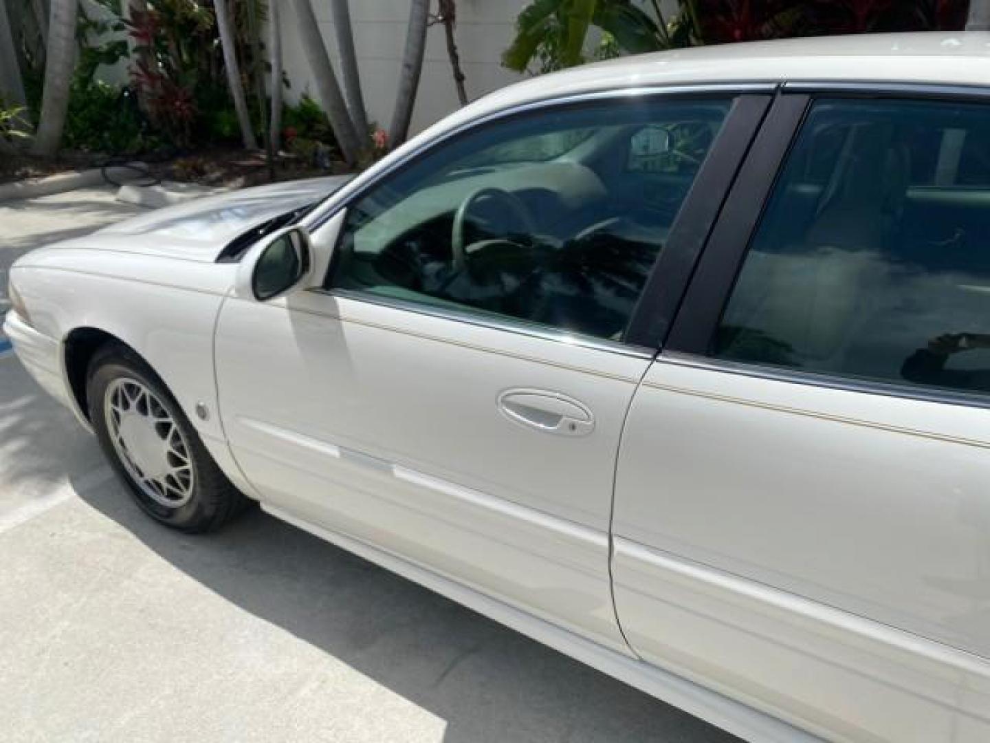 2003 White /Taupe Buick LeSabre Custom LOW MILES 32,880 1 OWNER (1G4HP54K63U) with an 3.8L 3800 V6 SFI Engine engine, Automatic transmission, located at 4701 North Dixie Hwy, Pompano Beach, FL, 33064, (954) 422-2889, 26.240938, -80.123474 - OUR WEBPAGE FLORIDACARS1.COM HAS OVER 100 PHOTOS AND FREE CARFAX LINK 2003 BUICK LESABRE CUSTOM VIN: 1G4HP54K63U139534 1 G 4 H P 5 4 K 6 3 U 1 3 9 5 3 4 SEDAN 4 DR 3.8L V6 F 12V 29 mpg GASOLINE FRONT WHEEL DRIVE Top Features Alloy Wheels Cloth Seats Leather Seats Luxury Package Basic Features ABS Br - Photo#27