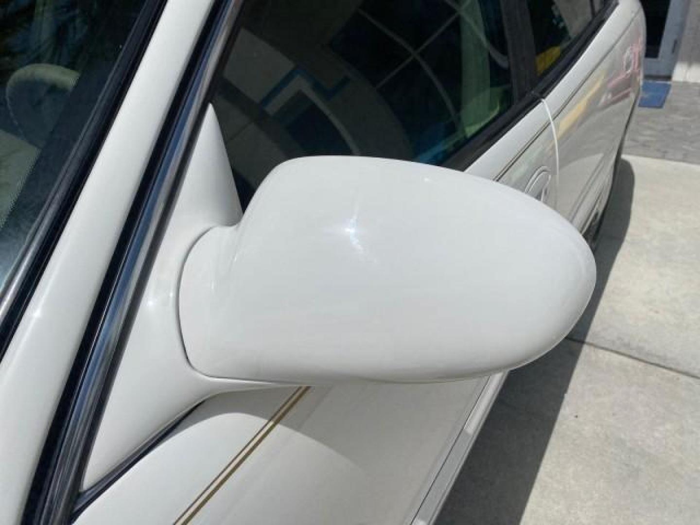 2003 White /Taupe Buick LeSabre Custom LOW MILES 32,880 1 OWNER (1G4HP54K63U) with an 3.8L 3800 V6 SFI Engine engine, Automatic transmission, located at 4701 North Dixie Hwy, Pompano Beach, FL, 33064, (954) 422-2889, 26.240938, -80.123474 - OUR WEBPAGE FLORIDACARS1.COM HAS OVER 100 PHOTOS AND FREE CARFAX LINK 2003 BUICK LESABRE CUSTOM VIN: 1G4HP54K63U139534 1 G 4 H P 5 4 K 6 3 U 1 3 9 5 3 4 SEDAN 4 DR 3.8L V6 F 12V 29 mpg GASOLINE FRONT WHEEL DRIVE Top Features Alloy Wheels Cloth Seats Leather Seats Luxury Package Basic Features ABS Br - Photo#30