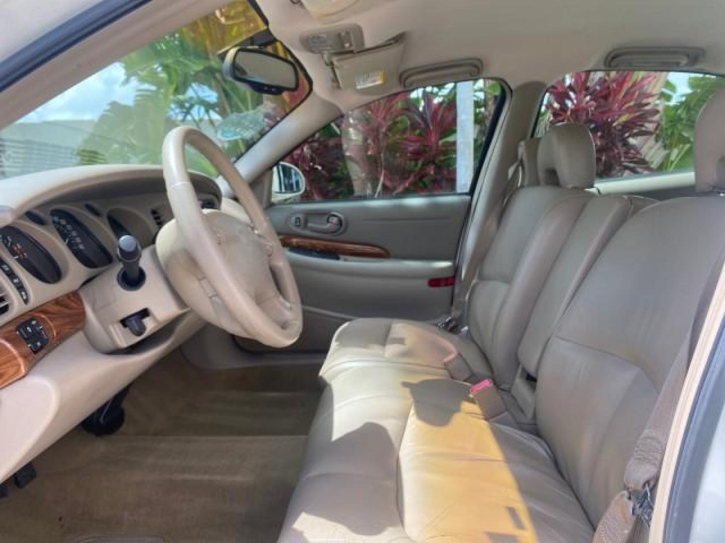 2003 White /Taupe Buick LeSabre Custom LOW MILES 32,880 1 OWNER (1G4HP54K63U) with an 3.8L 3800 V6 SFI Engine engine, Automatic transmission, located at 4701 North Dixie Hwy, Pompano Beach, FL, 33064, (954) 422-2889, 26.240938, -80.123474 - OUR WEBPAGE FLORIDACARS1.COM HAS OVER 100 PHOTOS AND FREE CARFAX LINK 2003 BUICK LESABRE CUSTOM VIN: 1G4HP54K63U139534 1 G 4 H P 5 4 K 6 3 U 1 3 9 5 3 4 SEDAN 4 DR 3.8L V6 F 12V 29 mpg GASOLINE FRONT WHEEL DRIVE Top Features Alloy Wheels Cloth Seats Leather Seats Luxury Package Basic Features ABS Br - Photo#34