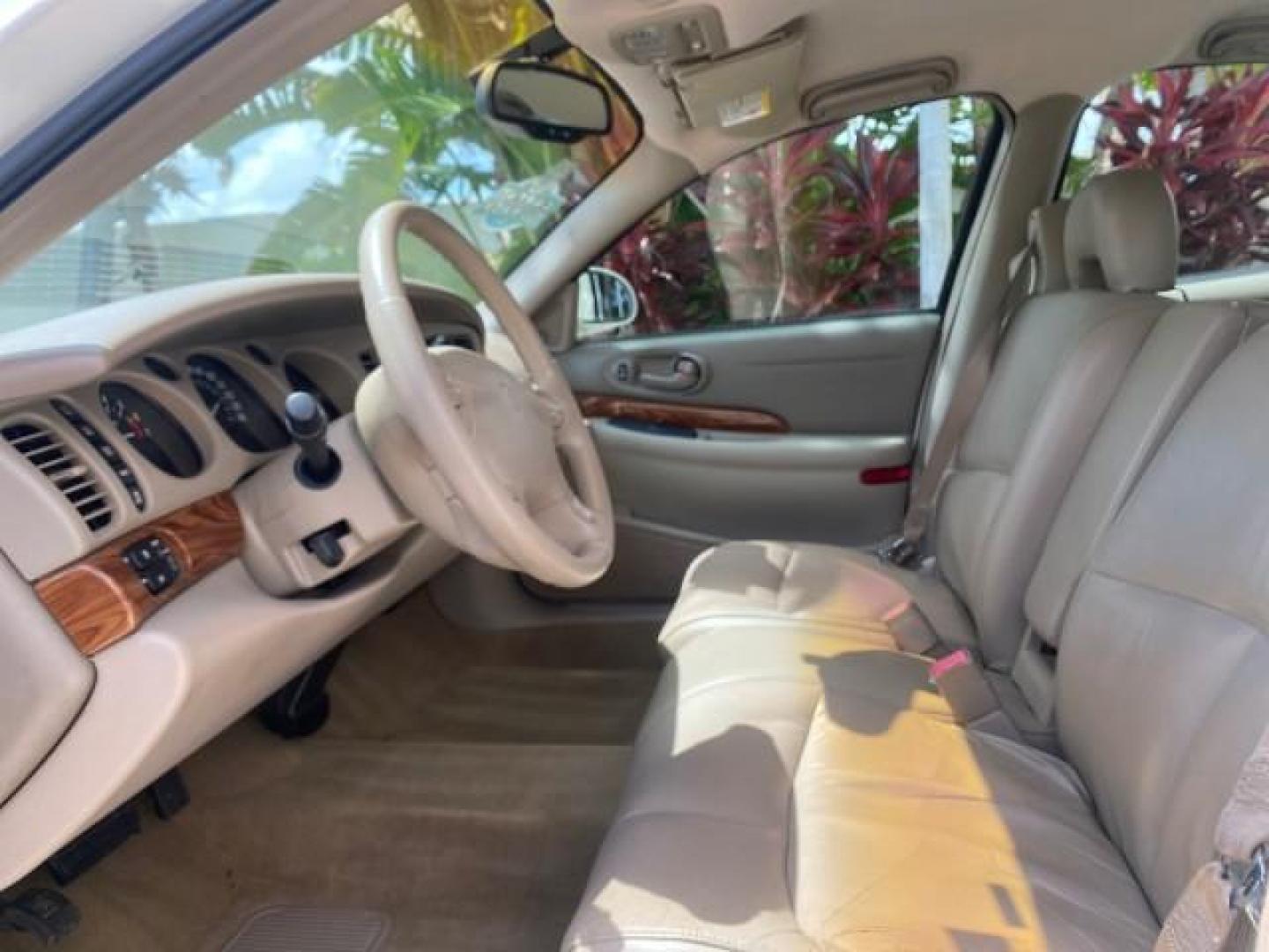 2003 White /Taupe Buick LeSabre Custom LOW MILES 32,880 1 OWNER (1G4HP54K63U) with an 3.8L 3800 V6 SFI Engine engine, Automatic transmission, located at 4701 North Dixie Hwy, Pompano Beach, FL, 33064, (954) 422-2889, 26.240938, -80.123474 - OUR WEBPAGE FLORIDACARS1.COM HAS OVER 100 PHOTOS AND FREE CARFAX LINK 2003 BUICK LESABRE CUSTOM VIN: 1G4HP54K63U139534 1 G 4 H P 5 4 K 6 3 U 1 3 9 5 3 4 SEDAN 4 DR 3.8L V6 F 12V 29 mpg GASOLINE FRONT WHEEL DRIVE Top Features Alloy Wheels Cloth Seats Leather Seats Luxury Package Basic Features ABS Br - Photo#35