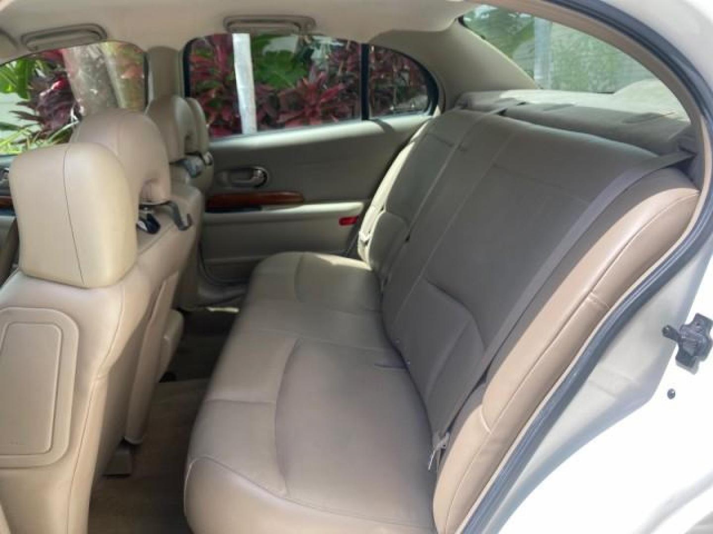 2003 White /Taupe Buick LeSabre Custom LOW MILES 32,880 1 OWNER (1G4HP54K63U) with an 3.8L 3800 V6 SFI Engine engine, Automatic transmission, located at 4701 North Dixie Hwy, Pompano Beach, FL, 33064, (954) 422-2889, 26.240938, -80.123474 - OUR WEBPAGE FLORIDACARS1.COM HAS OVER 100 PHOTOS AND FREE CARFAX LINK 2003 BUICK LESABRE CUSTOM VIN: 1G4HP54K63U139534 1 G 4 H P 5 4 K 6 3 U 1 3 9 5 3 4 SEDAN 4 DR 3.8L V6 F 12V 29 mpg GASOLINE FRONT WHEEL DRIVE Top Features Alloy Wheels Cloth Seats Leather Seats Luxury Package Basic Features ABS Br - Photo#61