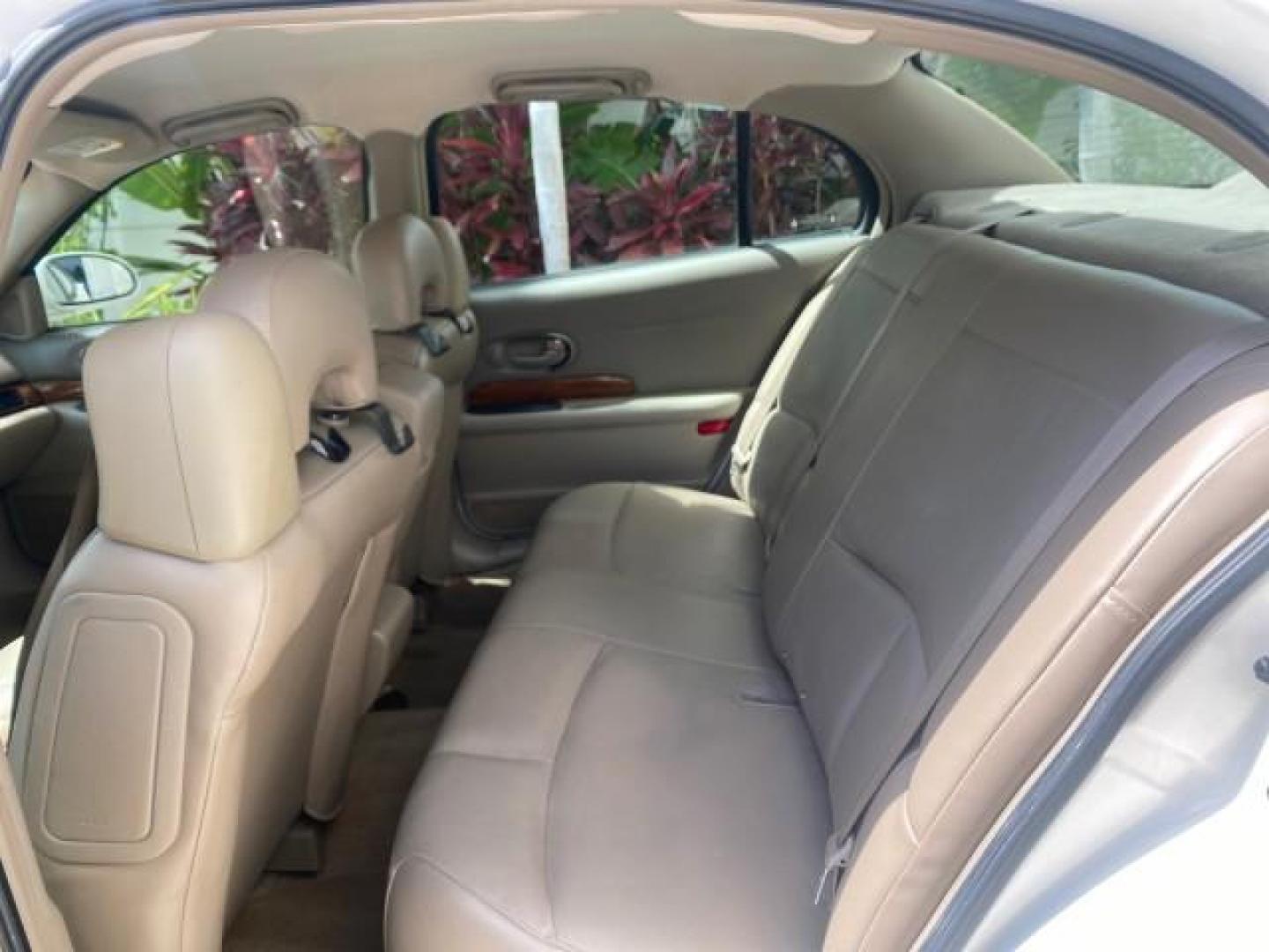 2003 White /Taupe Buick LeSabre Custom LOW MILES 32,880 1 OWNER (1G4HP54K63U) with an 3.8L 3800 V6 SFI Engine engine, Automatic transmission, located at 4701 North Dixie Hwy, Pompano Beach, FL, 33064, (954) 422-2889, 26.240938, -80.123474 - OUR WEBPAGE FLORIDACARS1.COM HAS OVER 100 PHOTOS AND FREE CARFAX LINK 2003 BUICK LESABRE CUSTOM VIN: 1G4HP54K63U139534 1 G 4 H P 5 4 K 6 3 U 1 3 9 5 3 4 SEDAN 4 DR 3.8L V6 F 12V 29 mpg GASOLINE FRONT WHEEL DRIVE Top Features Alloy Wheels Cloth Seats Leather Seats Luxury Package Basic Features ABS Br - Photo#62