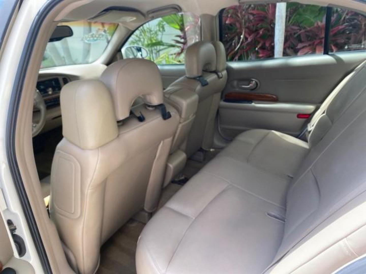 2003 White /Taupe Buick LeSabre Custom LOW MILES 32,880 1 OWNER (1G4HP54K63U) with an 3.8L 3800 V6 SFI Engine engine, Automatic transmission, located at 4701 North Dixie Hwy, Pompano Beach, FL, 33064, (954) 422-2889, 26.240938, -80.123474 - OUR WEBPAGE FLORIDACARS1.COM HAS OVER 100 PHOTOS AND FREE CARFAX LINK 2003 BUICK LESABRE CUSTOM VIN: 1G4HP54K63U139534 1 G 4 H P 5 4 K 6 3 U 1 3 9 5 3 4 SEDAN 4 DR 3.8L V6 F 12V 29 mpg GASOLINE FRONT WHEEL DRIVE Top Features Alloy Wheels Cloth Seats Leather Seats Luxury Package Basic Features ABS Br - Photo#64