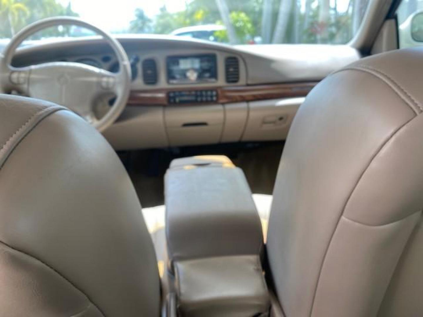 2003 White /Taupe Buick LeSabre Custom LOW MILES 32,880 1 OWNER (1G4HP54K63U) with an 3.8L 3800 V6 SFI Engine engine, Automatic transmission, located at 4701 North Dixie Hwy, Pompano Beach, FL, 33064, (954) 422-2889, 26.240938, -80.123474 - OUR WEBPAGE FLORIDACARS1.COM HAS OVER 100 PHOTOS AND FREE CARFAX LINK 2003 BUICK LESABRE CUSTOM VIN: 1G4HP54K63U139534 1 G 4 H P 5 4 K 6 3 U 1 3 9 5 3 4 SEDAN 4 DR 3.8L V6 F 12V 29 mpg GASOLINE FRONT WHEEL DRIVE Top Features Alloy Wheels Cloth Seats Leather Seats Luxury Package Basic Features ABS Br - Photo#67