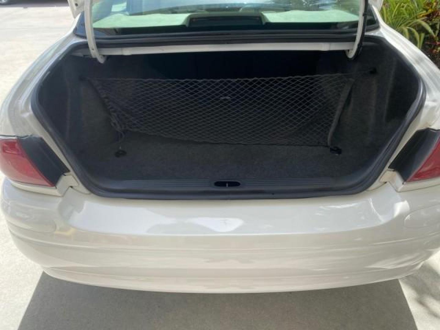 2003 White /Taupe Buick LeSabre Custom LOW MILES 32,880 1 OWNER (1G4HP54K63U) with an 3.8L 3800 V6 SFI Engine engine, Automatic transmission, located at 4701 North Dixie Hwy, Pompano Beach, FL, 33064, (954) 422-2889, 26.240938, -80.123474 - OUR WEBPAGE FLORIDACARS1.COM HAS OVER 100 PHOTOS AND FREE CARFAX LINK 2003 BUICK LESABRE CUSTOM VIN: 1G4HP54K63U139534 1 G 4 H P 5 4 K 6 3 U 1 3 9 5 3 4 SEDAN 4 DR 3.8L V6 F 12V 29 mpg GASOLINE FRONT WHEEL DRIVE Top Features Alloy Wheels Cloth Seats Leather Seats Luxury Package Basic Features ABS Br - Photo#77