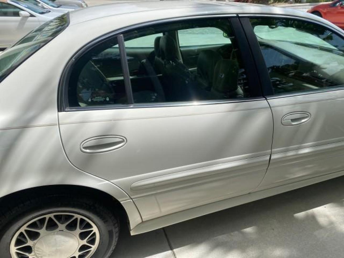 2003 White /Taupe Buick LeSabre Custom LOW MILES 32,880 1 OWNER (1G4HP54K63U) with an 3.8L 3800 V6 SFI Engine engine, Automatic transmission, located at 4701 North Dixie Hwy, Pompano Beach, FL, 33064, (954) 422-2889, 26.240938, -80.123474 - OUR WEBPAGE FLORIDACARS1.COM HAS OVER 100 PHOTOS AND FREE CARFAX LINK 2003 BUICK LESABRE CUSTOM VIN: 1G4HP54K63U139534 1 G 4 H P 5 4 K 6 3 U 1 3 9 5 3 4 SEDAN 4 DR 3.8L V6 F 12V 29 mpg GASOLINE FRONT WHEEL DRIVE Top Features Alloy Wheels Cloth Seats Leather Seats Luxury Package Basic Features ABS Br - Photo#83