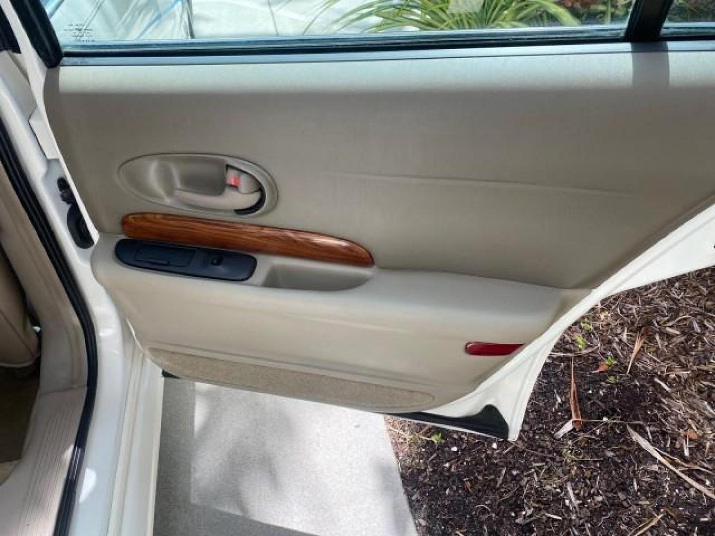 2003 White /Taupe Buick LeSabre Custom LOW MILES 32,880 1 OWNER (1G4HP54K63U) with an 3.8L 3800 V6 SFI Engine engine, Automatic transmission, located at 4701 North Dixie Hwy, Pompano Beach, FL, 33064, (954) 422-2889, 26.240938, -80.123474 - OUR WEBPAGE FLORIDACARS1.COM HAS OVER 100 PHOTOS AND FREE CARFAX LINK 2003 BUICK LESABRE CUSTOM VIN: 1G4HP54K63U139534 1 G 4 H P 5 4 K 6 3 U 1 3 9 5 3 4 SEDAN 4 DR 3.8L V6 F 12V 29 mpg GASOLINE FRONT WHEEL DRIVE Top Features Alloy Wheels Cloth Seats Leather Seats Luxury Package Basic Features ABS Br - Photo#85