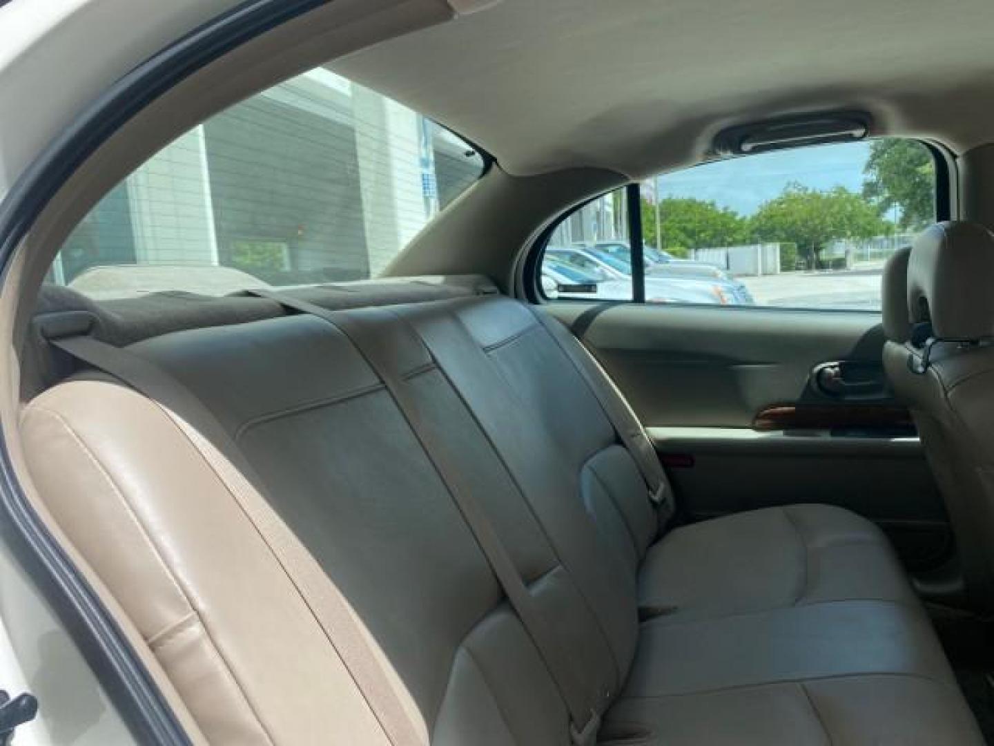 2003 White /Taupe Buick LeSabre Custom LOW MILES 32,880 1 OWNER (1G4HP54K63U) with an 3.8L 3800 V6 SFI Engine engine, Automatic transmission, located at 4701 North Dixie Hwy, Pompano Beach, FL, 33064, (954) 422-2889, 26.240938, -80.123474 - OUR WEBPAGE FLORIDACARS1.COM HAS OVER 100 PHOTOS AND FREE CARFAX LINK 2003 BUICK LESABRE CUSTOM VIN: 1G4HP54K63U139534 1 G 4 H P 5 4 K 6 3 U 1 3 9 5 3 4 SEDAN 4 DR 3.8L V6 F 12V 29 mpg GASOLINE FRONT WHEEL DRIVE Top Features Alloy Wheels Cloth Seats Leather Seats Luxury Package Basic Features ABS Br - Photo#86
