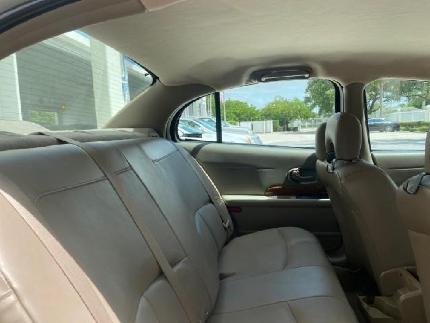 2003 White /Taupe Buick LeSabre Custom LOW MILES 32,880 1 OWNER (1G4HP54K63U) with an 3.8L 3800 V6 SFI Engine engine, Automatic transmission, located at 4701 North Dixie Hwy, Pompano Beach, FL, 33064, (954) 422-2889, 26.240938, -80.123474 - OUR WEBPAGE FLORIDACARS1.COM HAS OVER 100 PHOTOS AND FREE CARFAX LINK 2003 BUICK LESABRE CUSTOM VIN: 1G4HP54K63U139534 1 G 4 H P 5 4 K 6 3 U 1 3 9 5 3 4 SEDAN 4 DR 3.8L V6 F 12V 29 mpg GASOLINE FRONT WHEEL DRIVE Top Features Alloy Wheels Cloth Seats Leather Seats Luxury Package Basic Features ABS Br - Photo#87