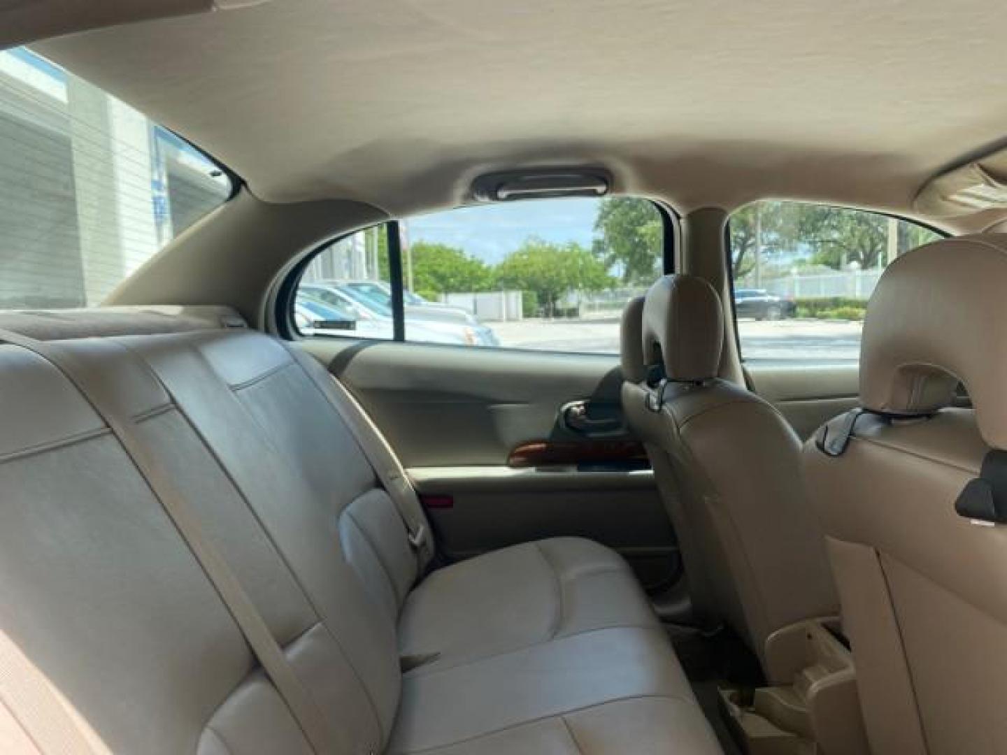 2003 White /Taupe Buick LeSabre Custom LOW MILES 32,880 1 OWNER (1G4HP54K63U) with an 3.8L 3800 V6 SFI Engine engine, Automatic transmission, located at 4701 North Dixie Hwy, Pompano Beach, FL, 33064, (954) 422-2889, 26.240938, -80.123474 - OUR WEBPAGE FLORIDACARS1.COM HAS OVER 100 PHOTOS AND FREE CARFAX LINK 2003 BUICK LESABRE CUSTOM VIN: 1G4HP54K63U139534 1 G 4 H P 5 4 K 6 3 U 1 3 9 5 3 4 SEDAN 4 DR 3.8L V6 F 12V 29 mpg GASOLINE FRONT WHEEL DRIVE Top Features Alloy Wheels Cloth Seats Leather Seats Luxury Package Basic Features ABS Br - Photo#88
